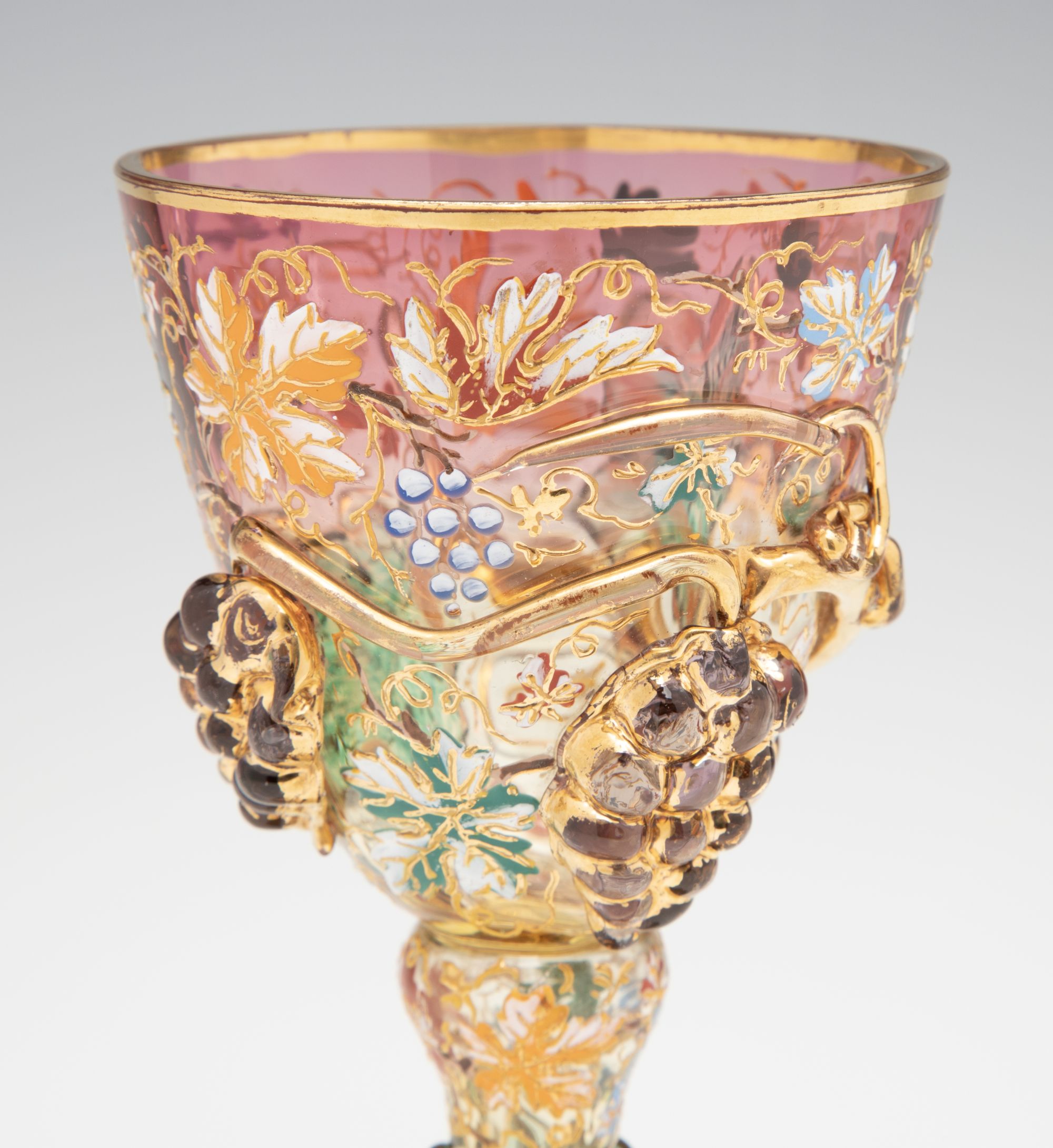 A MOSER SHADED PINK GOBLET WITH THICK APPLICATIONS