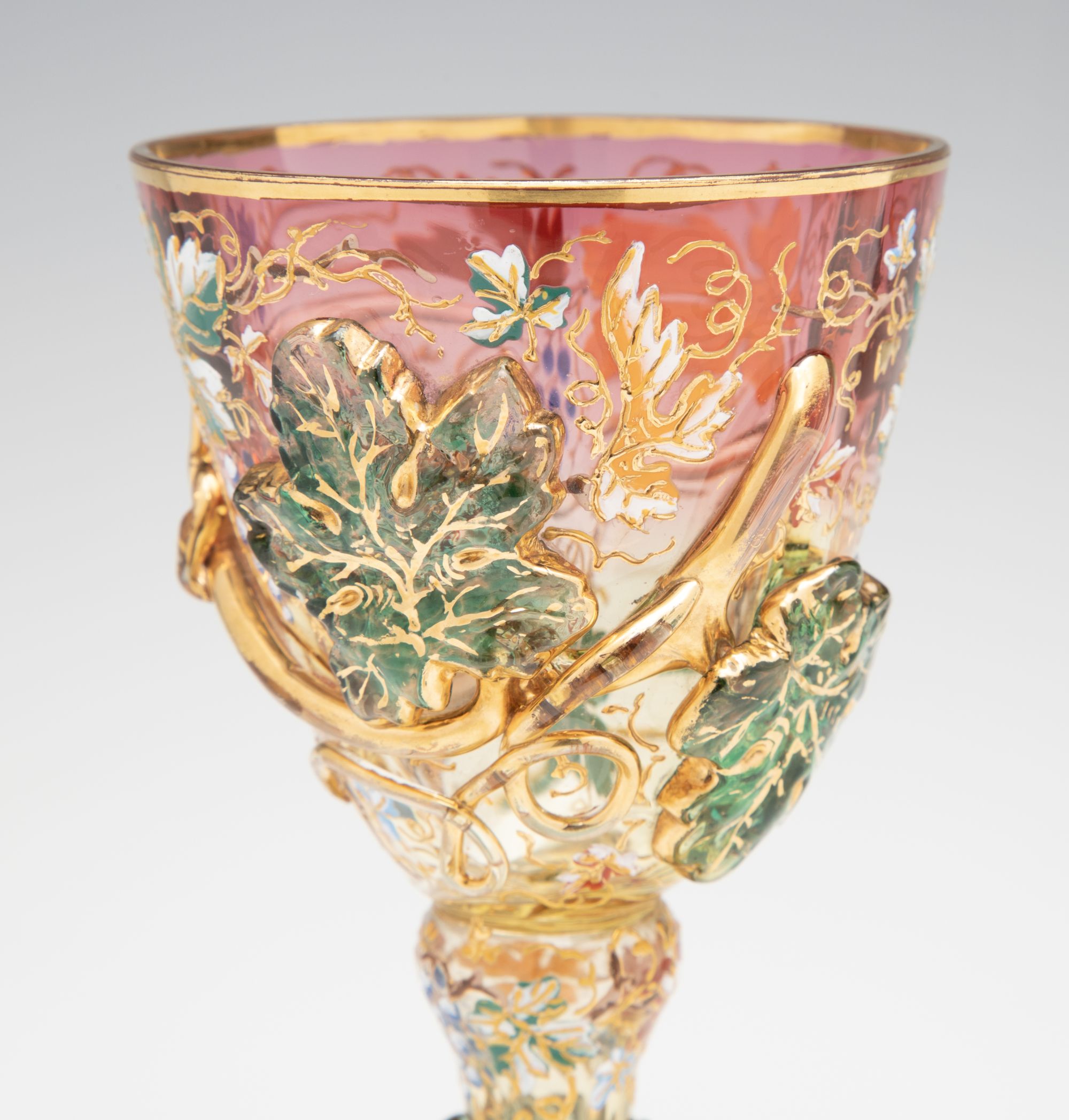 A MOSER SHADED PINK GOBLET WITH THICK APPLICATIONS