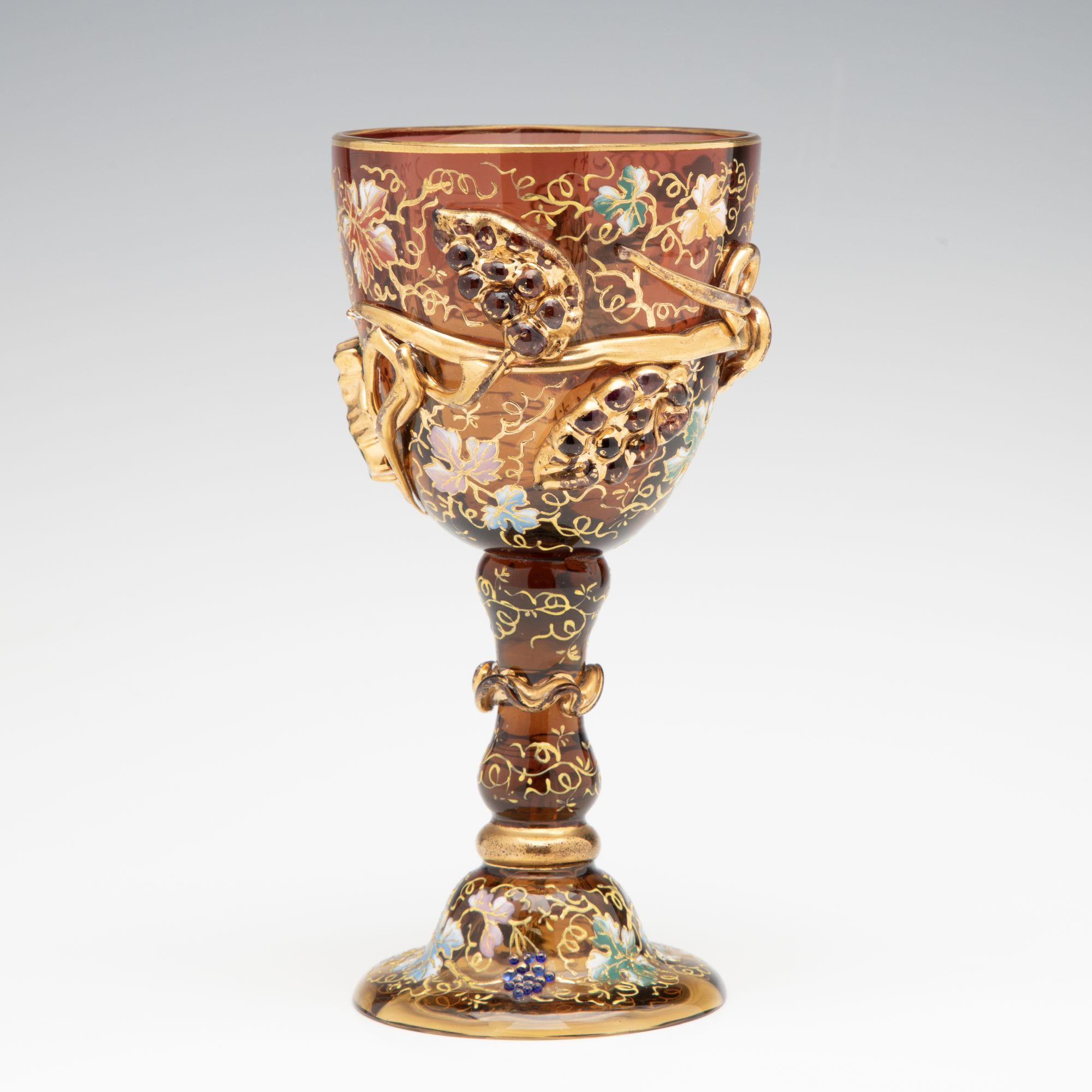 A MOSER DARK AMBERINA GOBLET WITH THICK APPLICATIONS