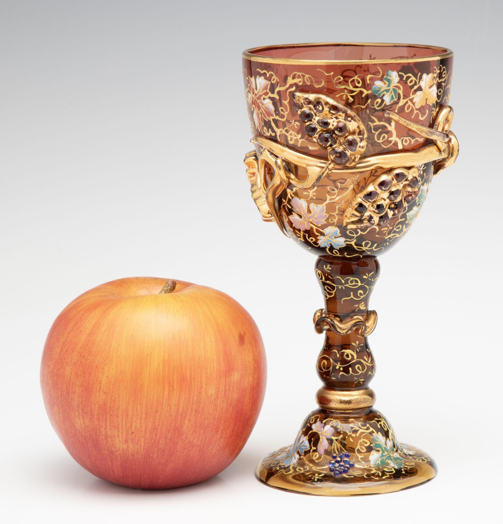 A MOSER DARK AMBERINA GOBLET WITH THICK APPLICATIONS