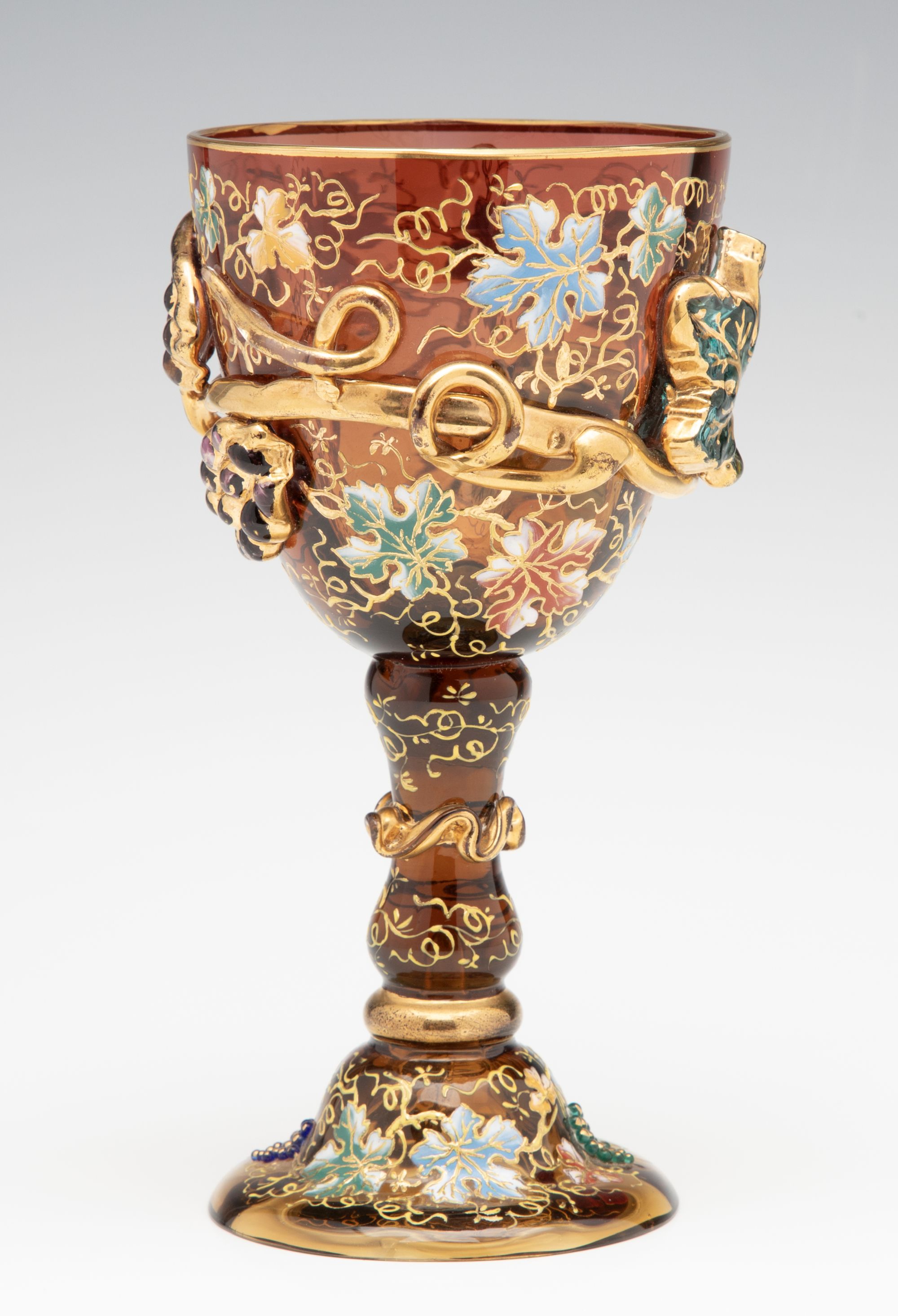 A MOSER DARK AMBERINA GOBLET WITH THICK APPLICATIONS