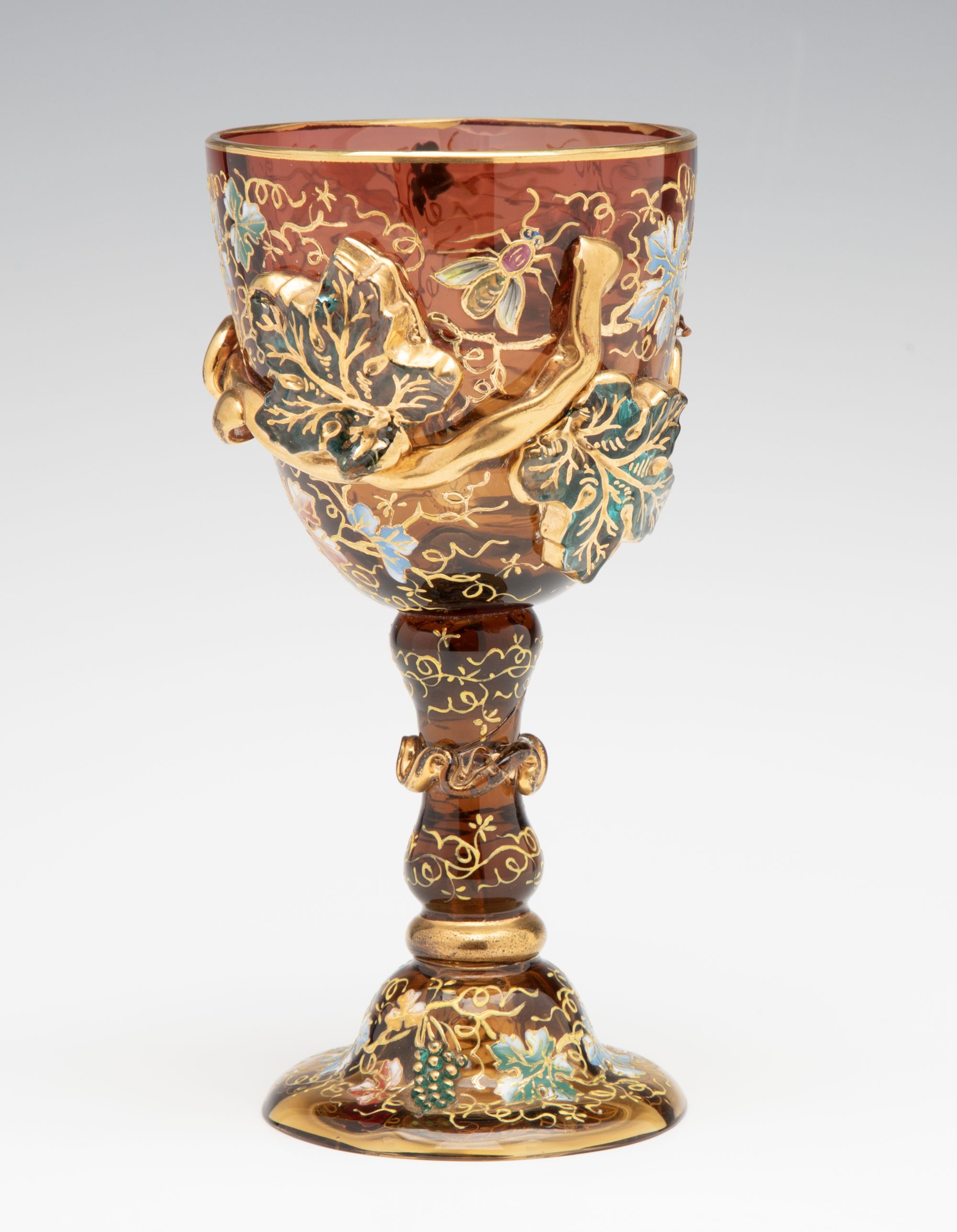 A MOSER DARK AMBERINA GOBLET WITH THICK APPLICATIONS