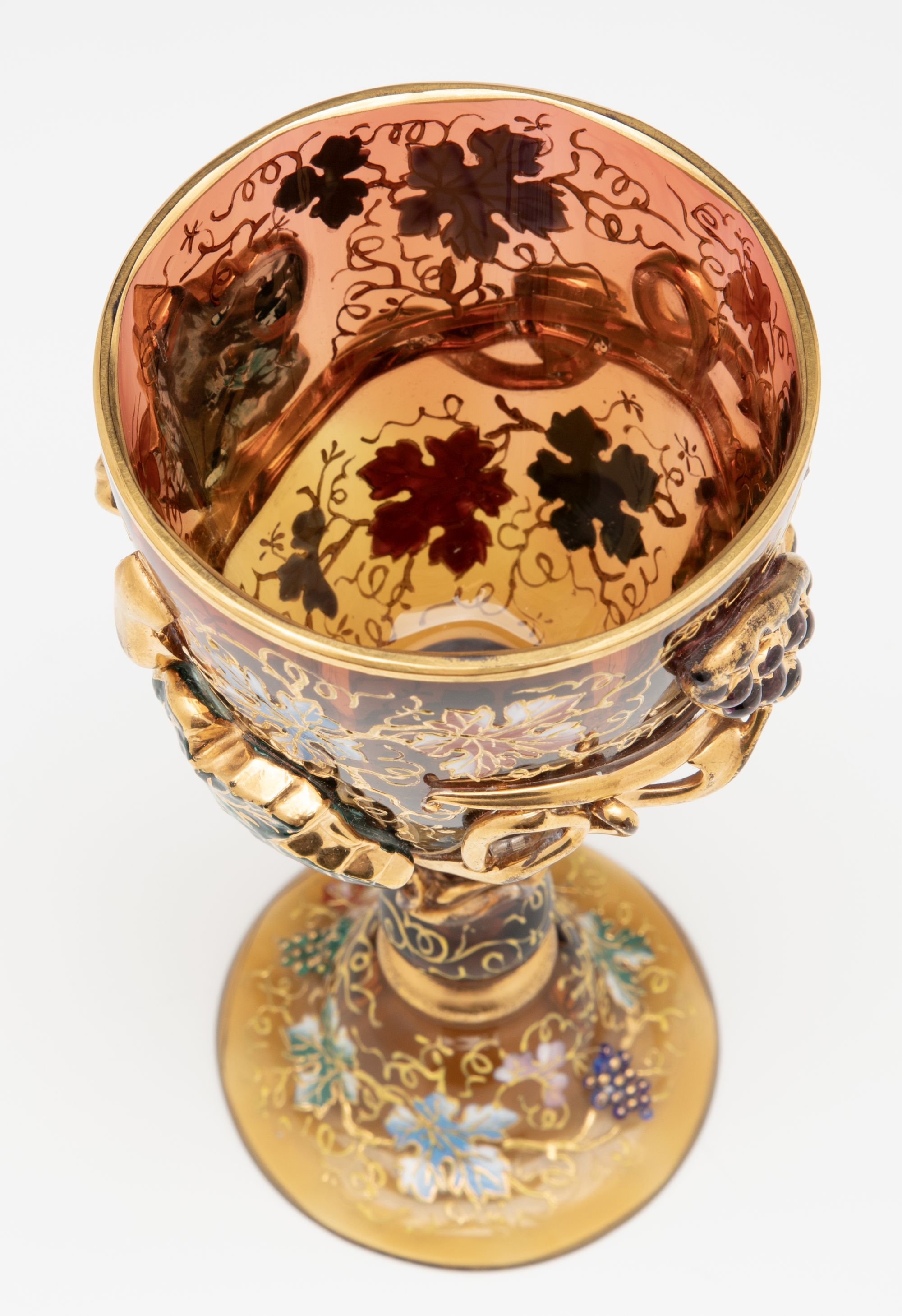 A MOSER DARK AMBERINA GOBLET WITH THICK APPLICATIONS