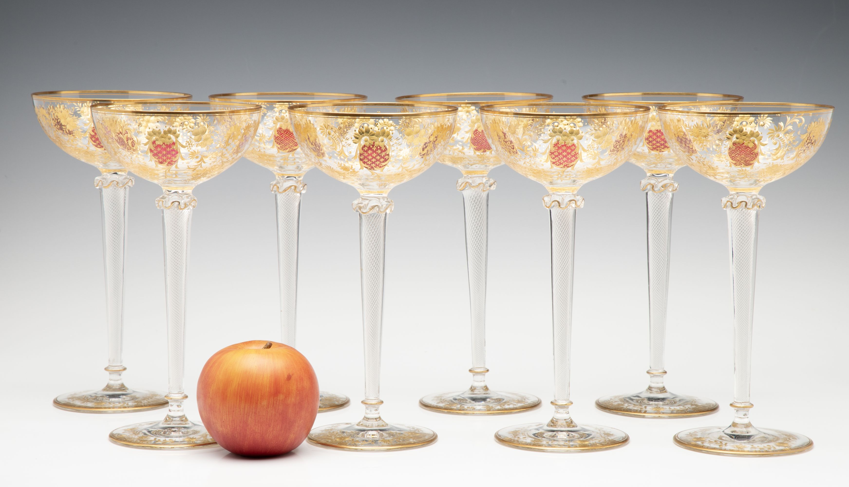 EIGHT TALL CONTINENTAL ART GLASS COUPE' STEMS C. 1920