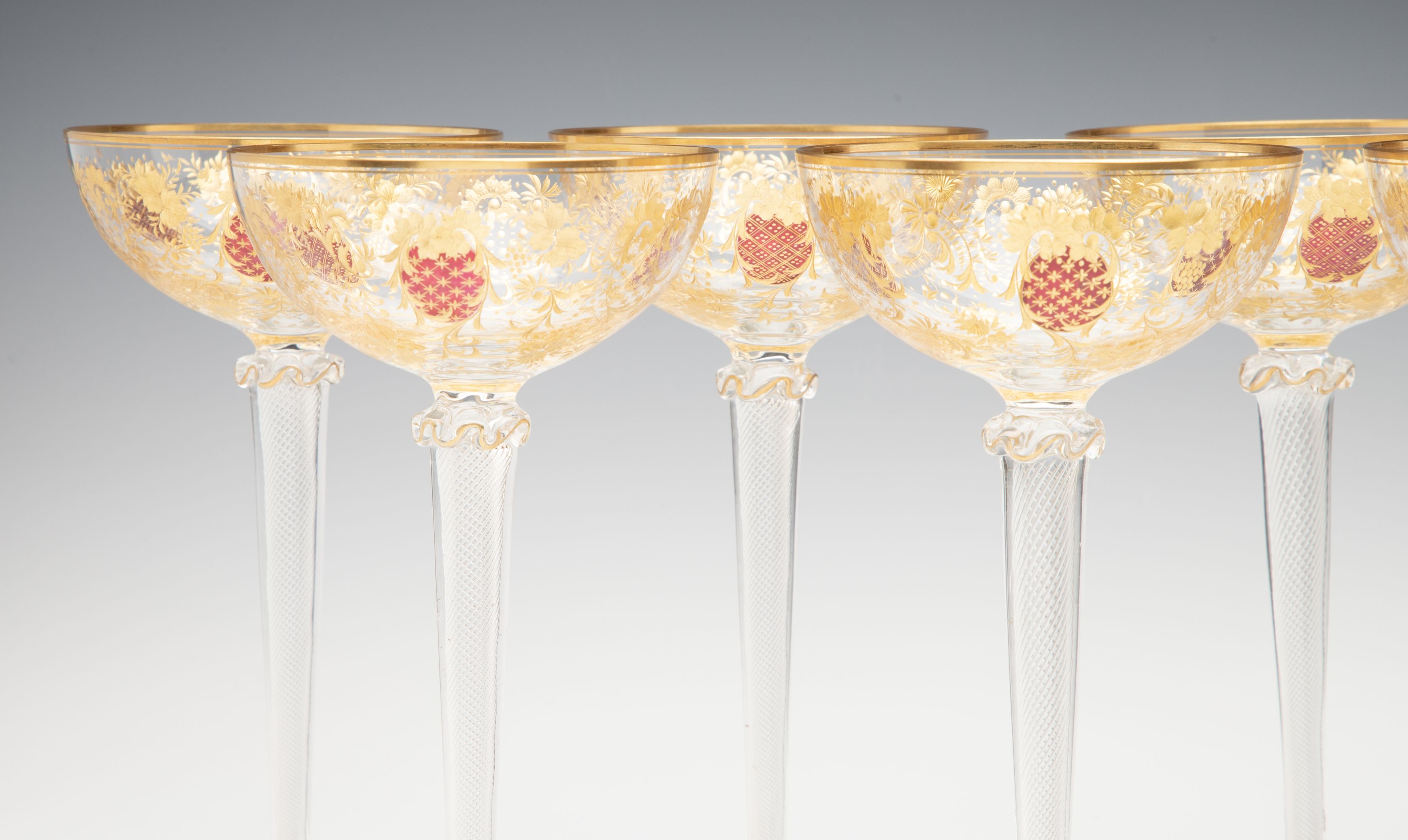 EIGHT TALL CONTINENTAL ART GLASS COUPE' STEMS C. 1920