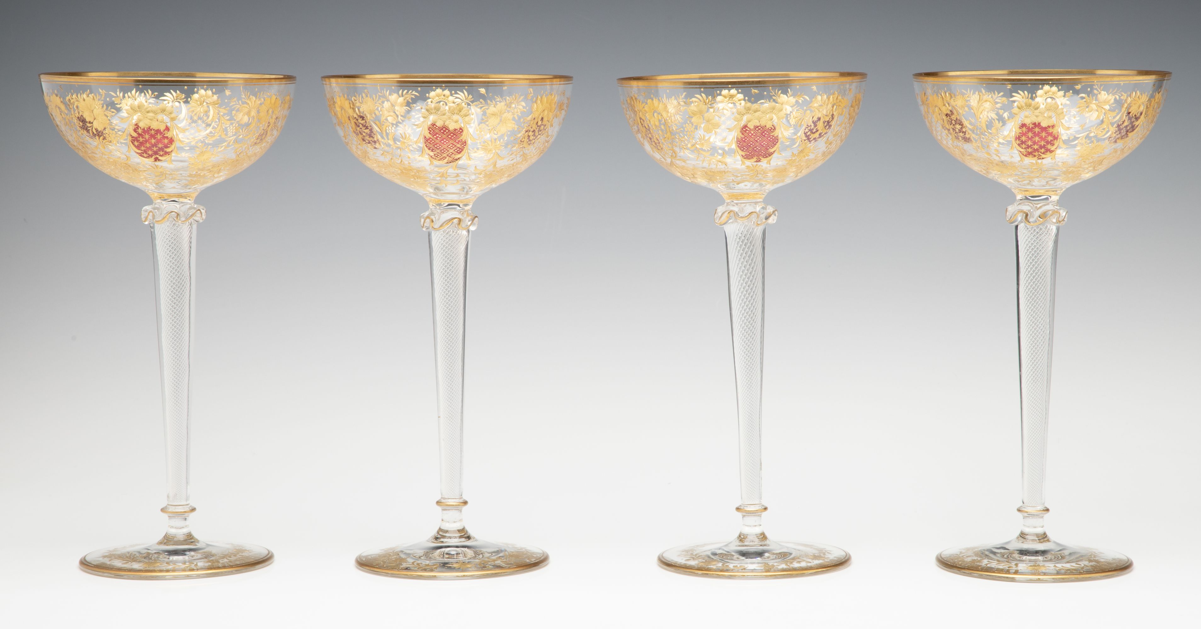 EIGHT TALL CONTINENTAL ART GLASS COUPE' STEMS C. 1920