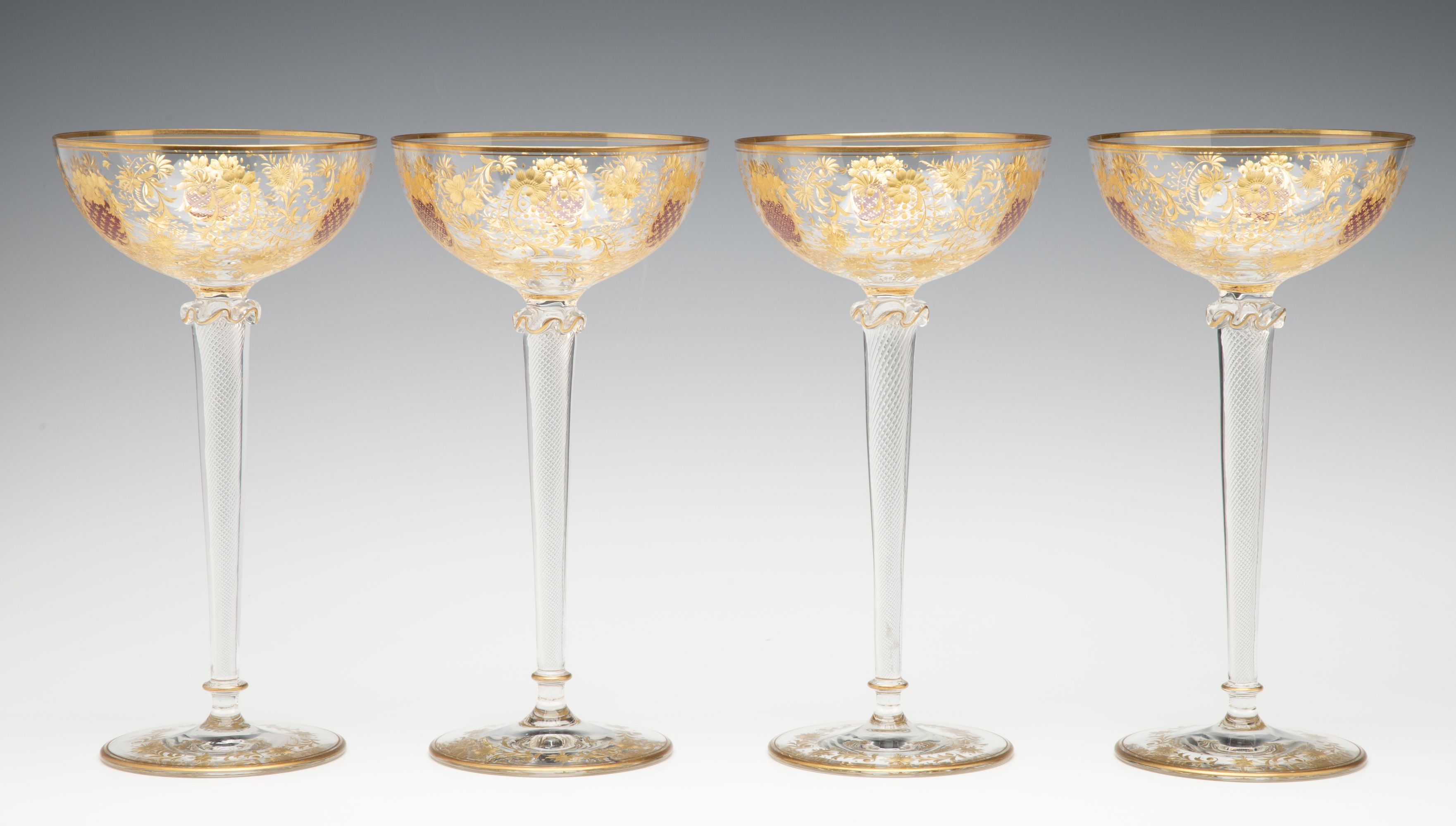 EIGHT TALL CONTINENTAL ART GLASS COUPE' STEMS C. 1920