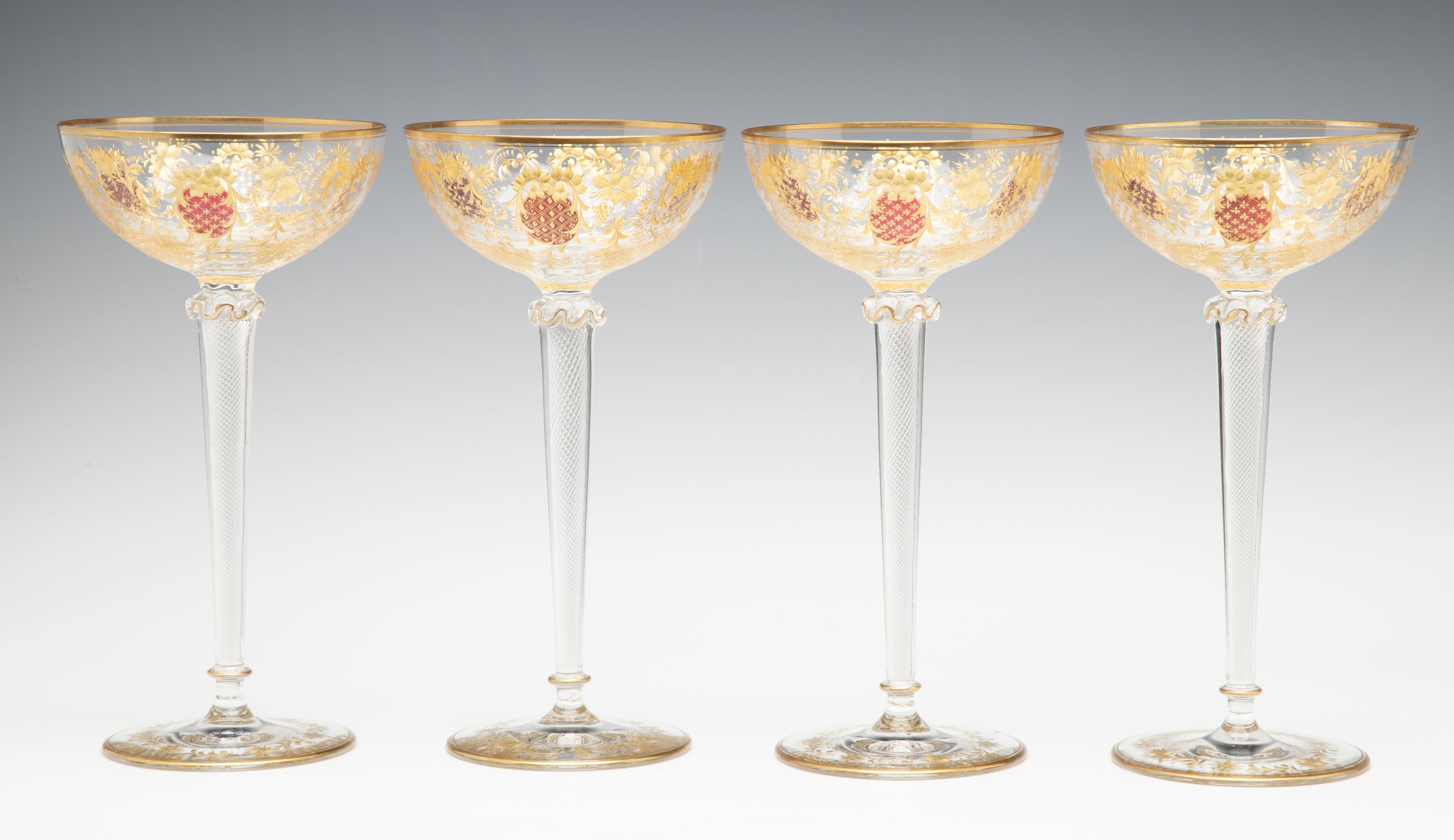 EIGHT TALL CONTINENTAL ART GLASS COUPE' STEMS C. 1920