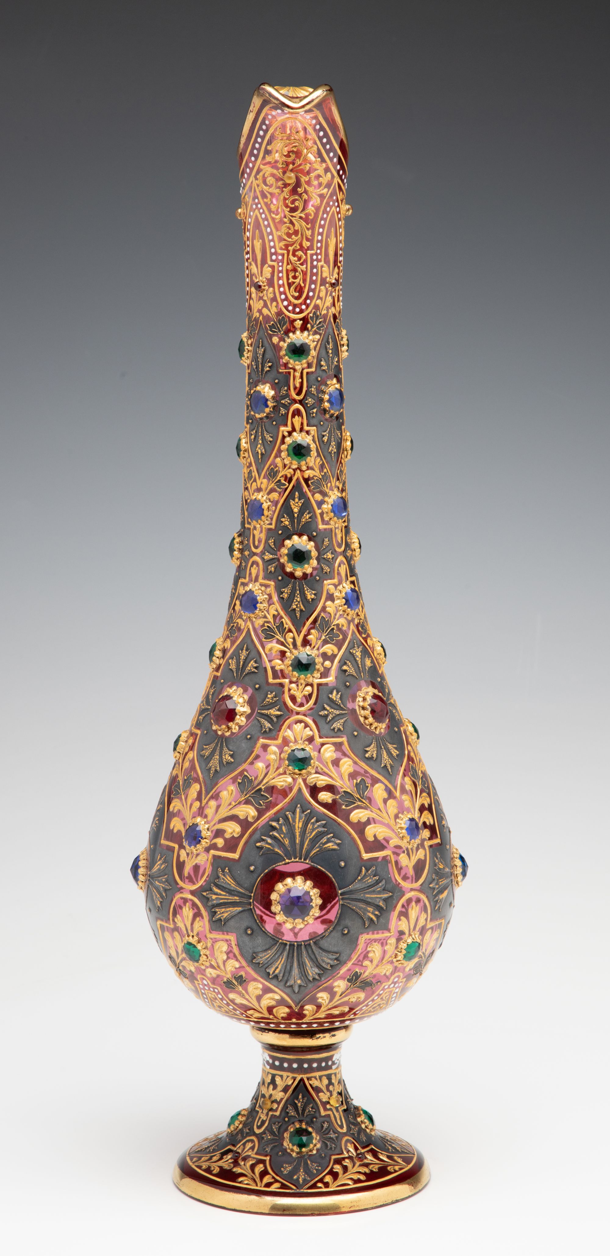 A JEWELED MOSER CRANBERRY EWER WITH MUGHAL DESIGNS