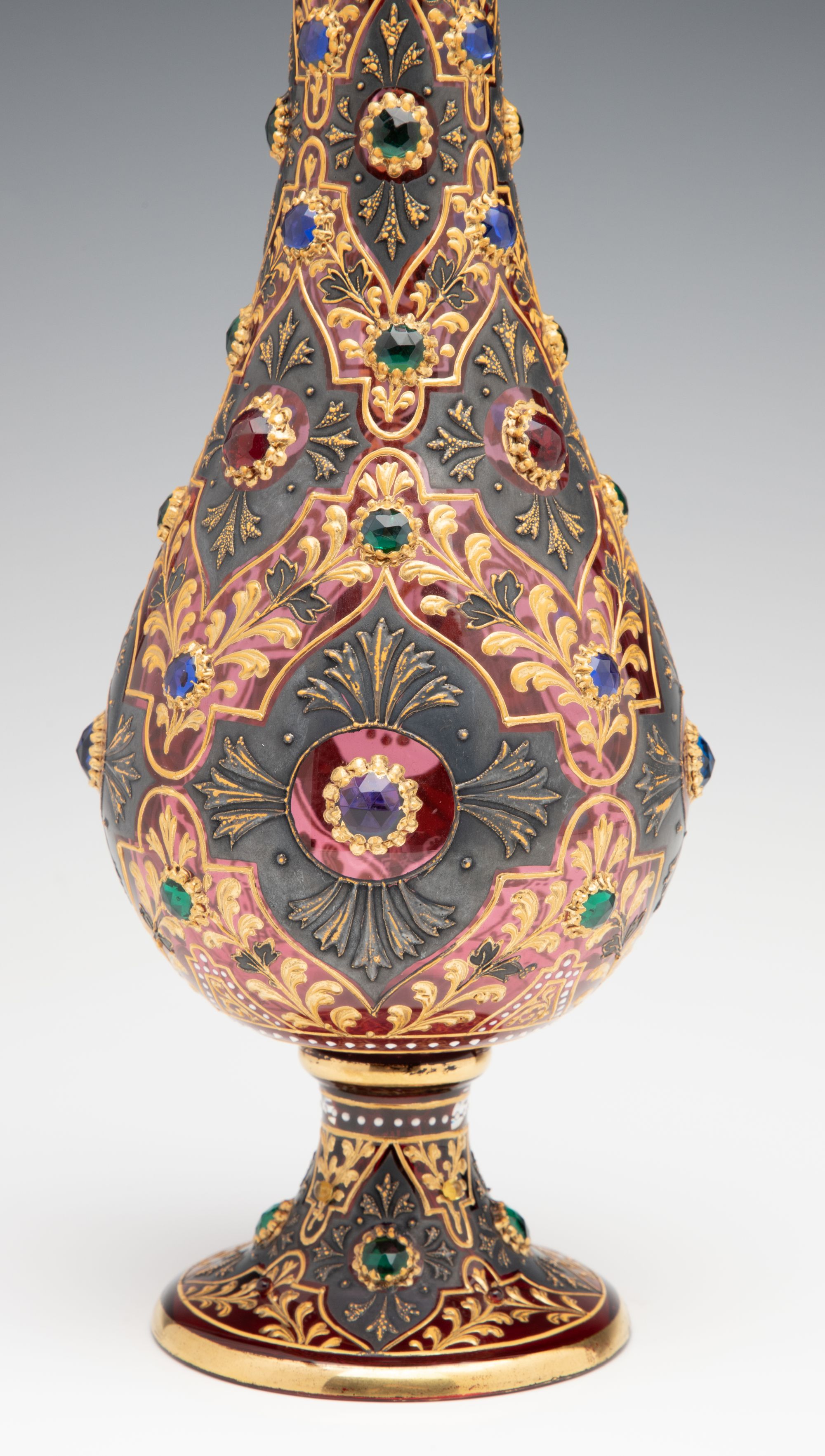 A JEWELED MOSER CRANBERRY EWER WITH MUGHAL DESIGNS