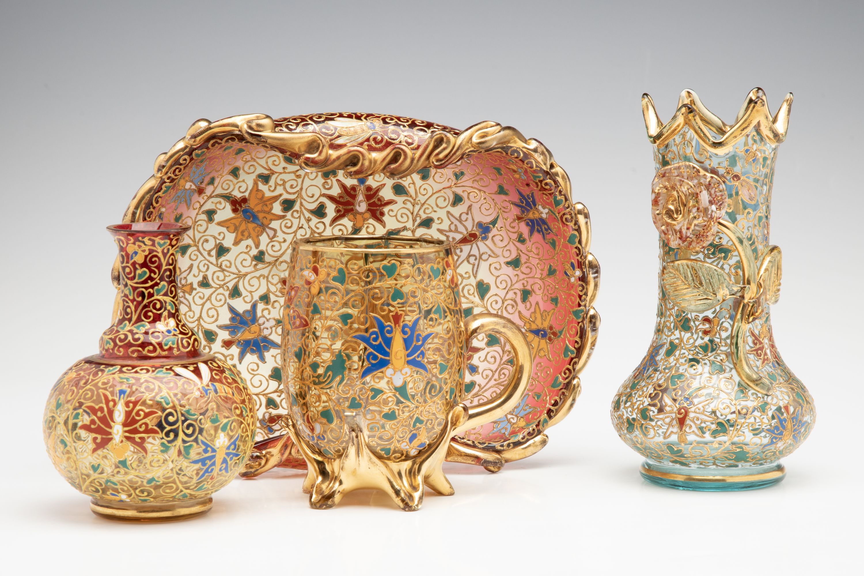 A GROUPING OF GILT AND ENAMEL DECORATED MOSER ART GLASS