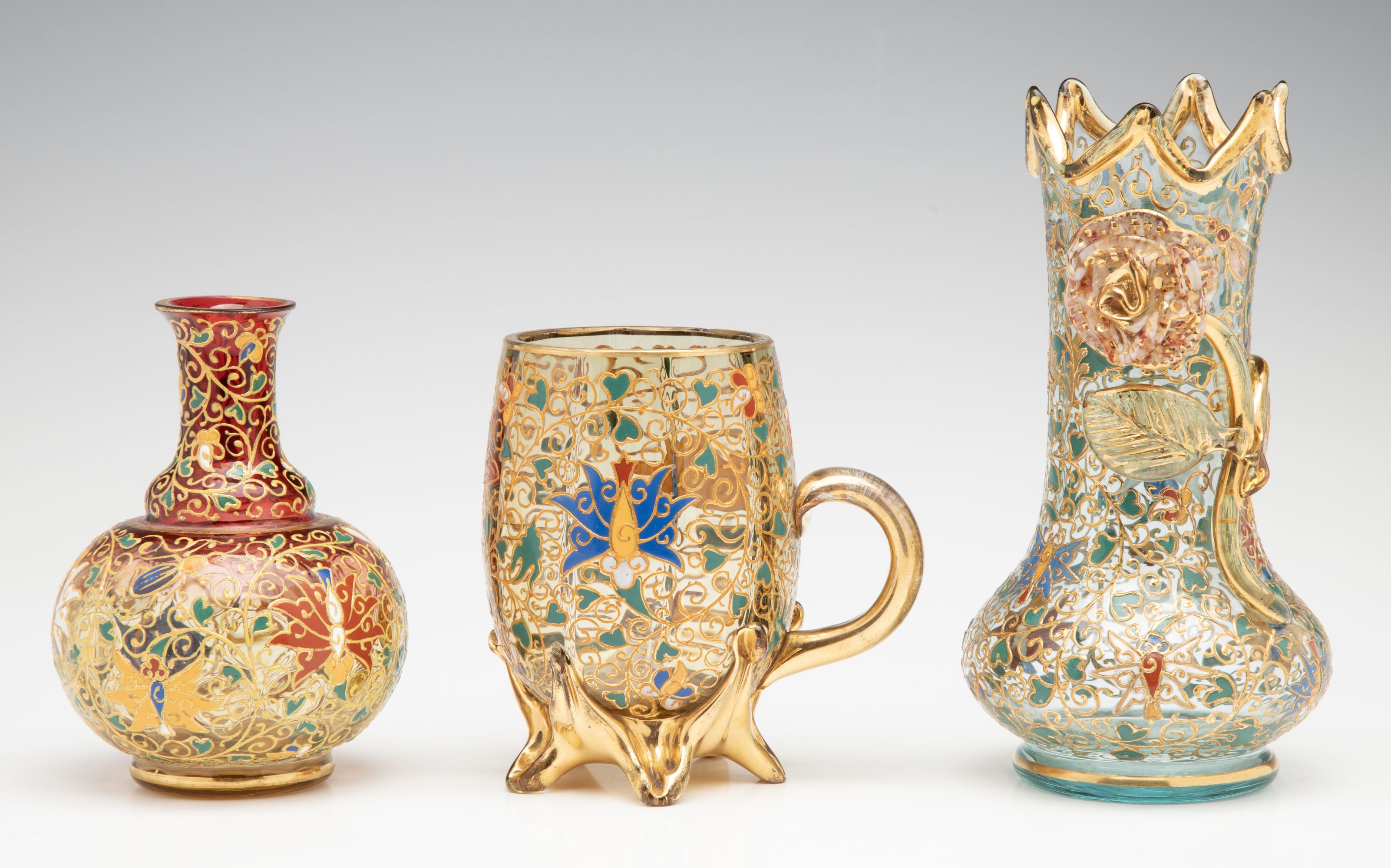 A GROUPING OF GILT AND ENAMEL DECORATED MOSER ART GLASS