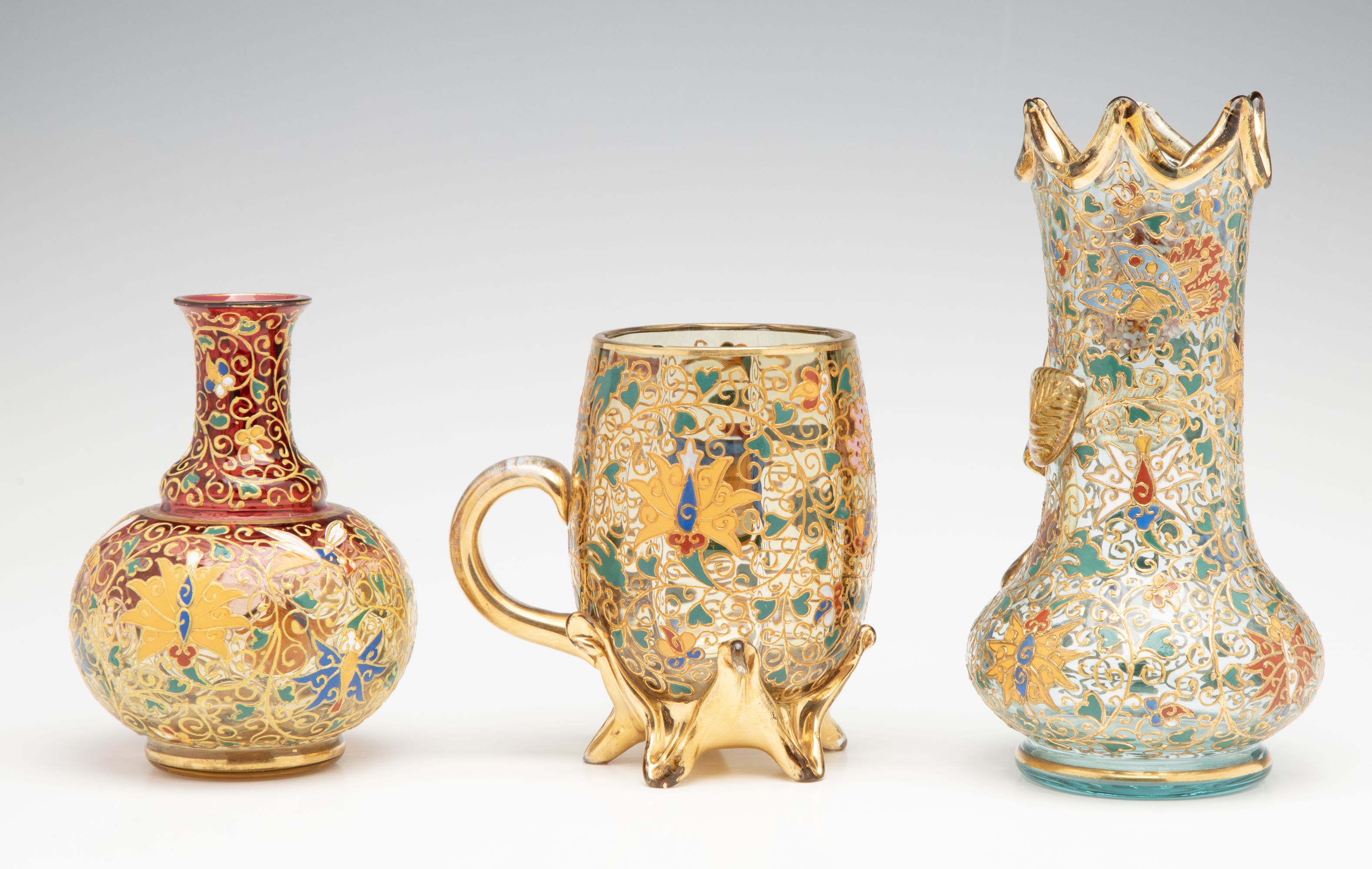 A GROUPING OF GILT AND ENAMEL DECORATED MOSER ART GLASS