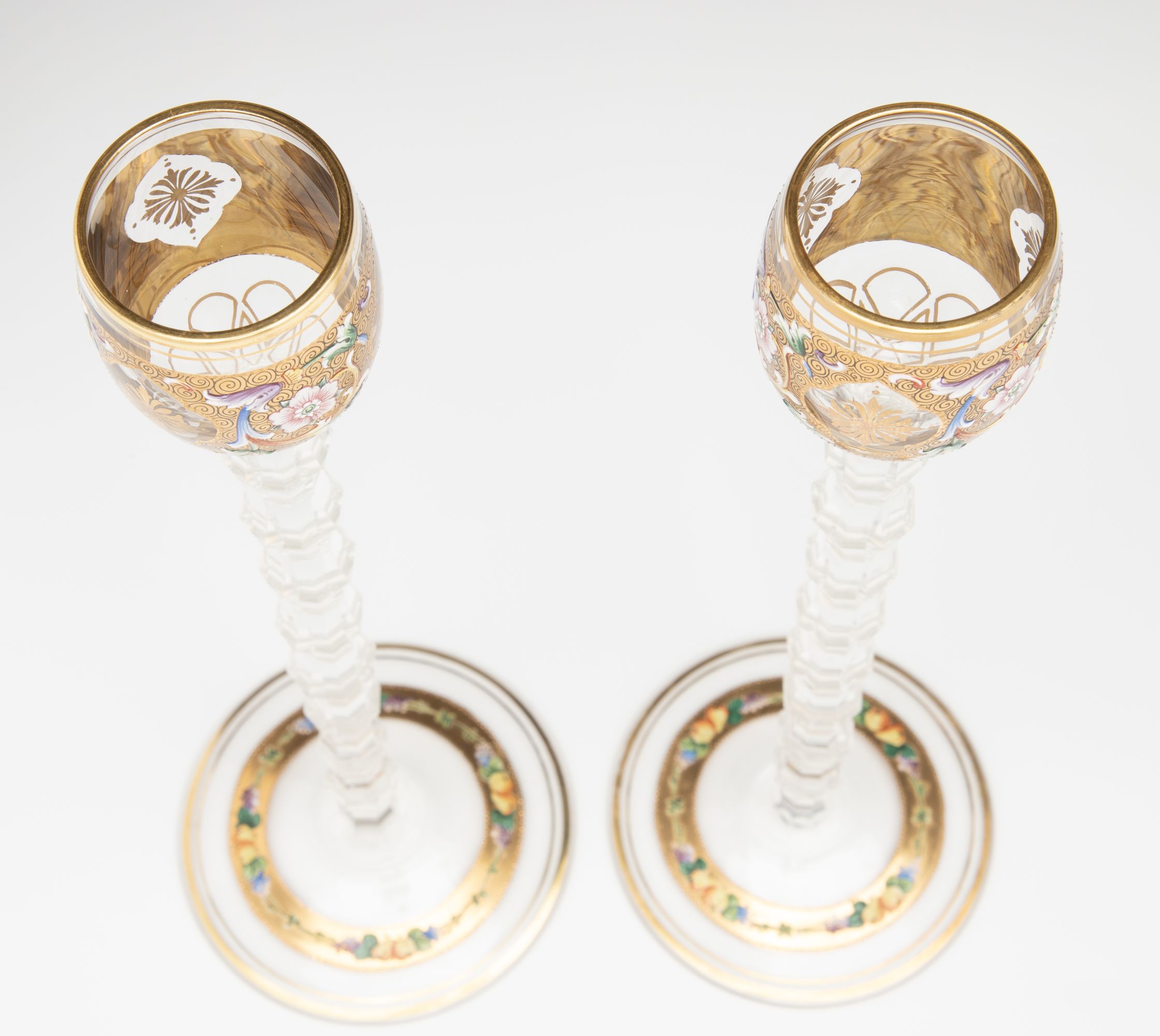 TWO MOSER GILT AND ENAMEL CORDIALS ON TALL CUT STEMS