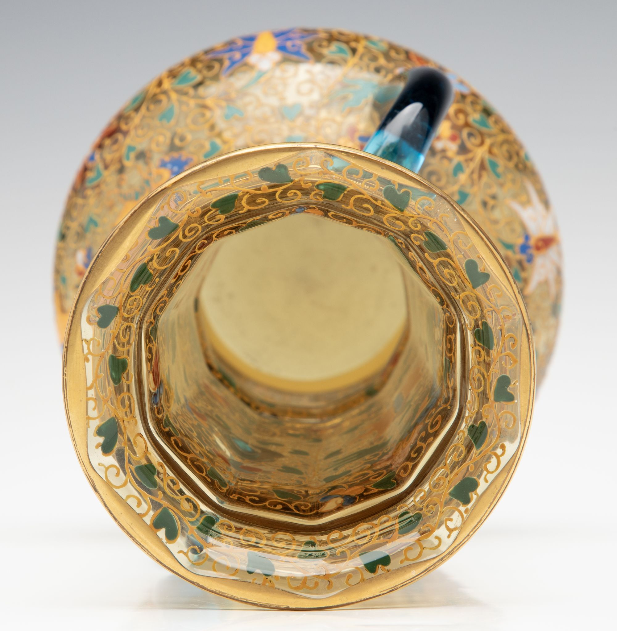 A MOSER GILT AND ENAMELED URN WITH APPLIED BLUE HANDLES