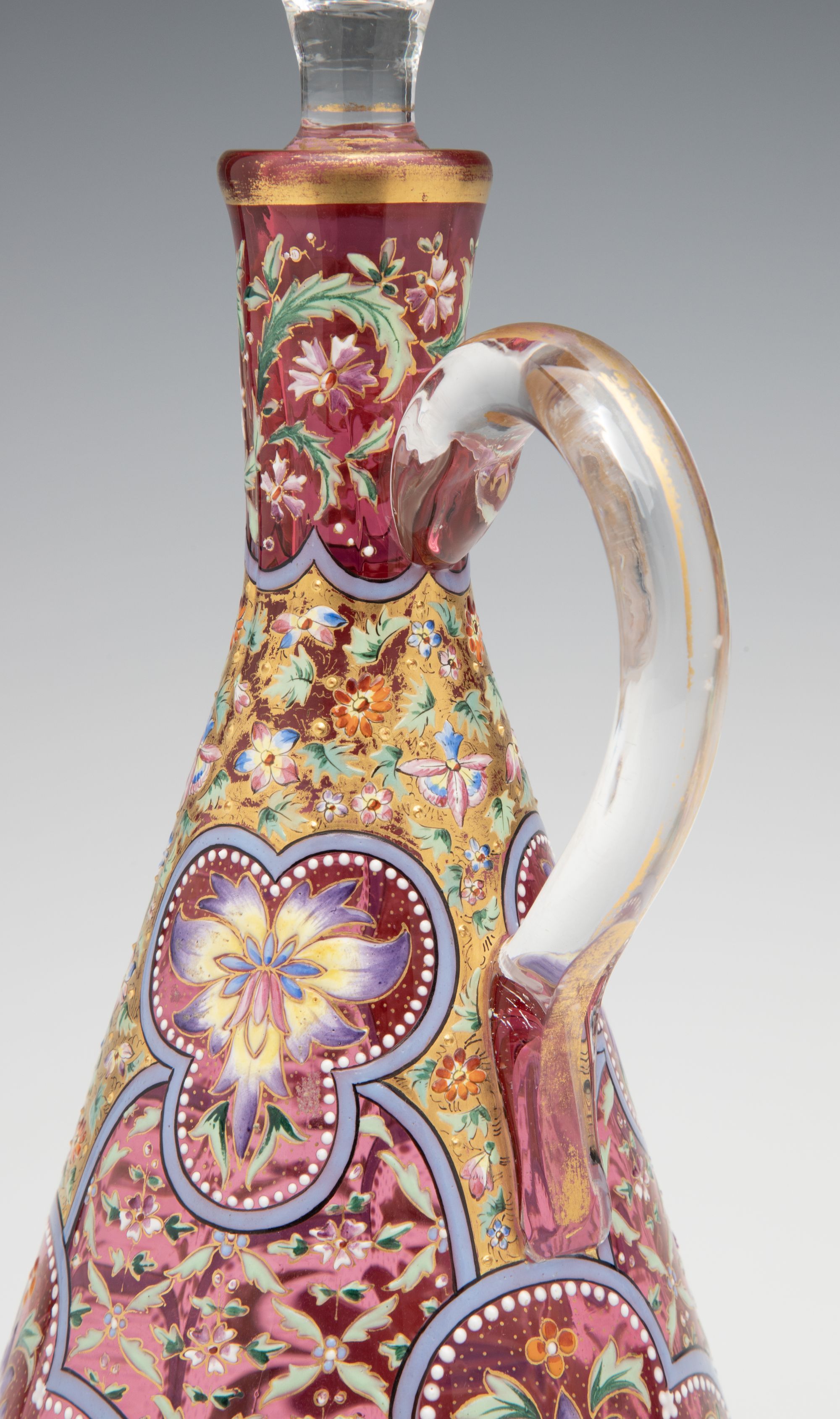 A LAVISHLY DECORATED CRANBERRY GLASS CRUET ATTR MOSER