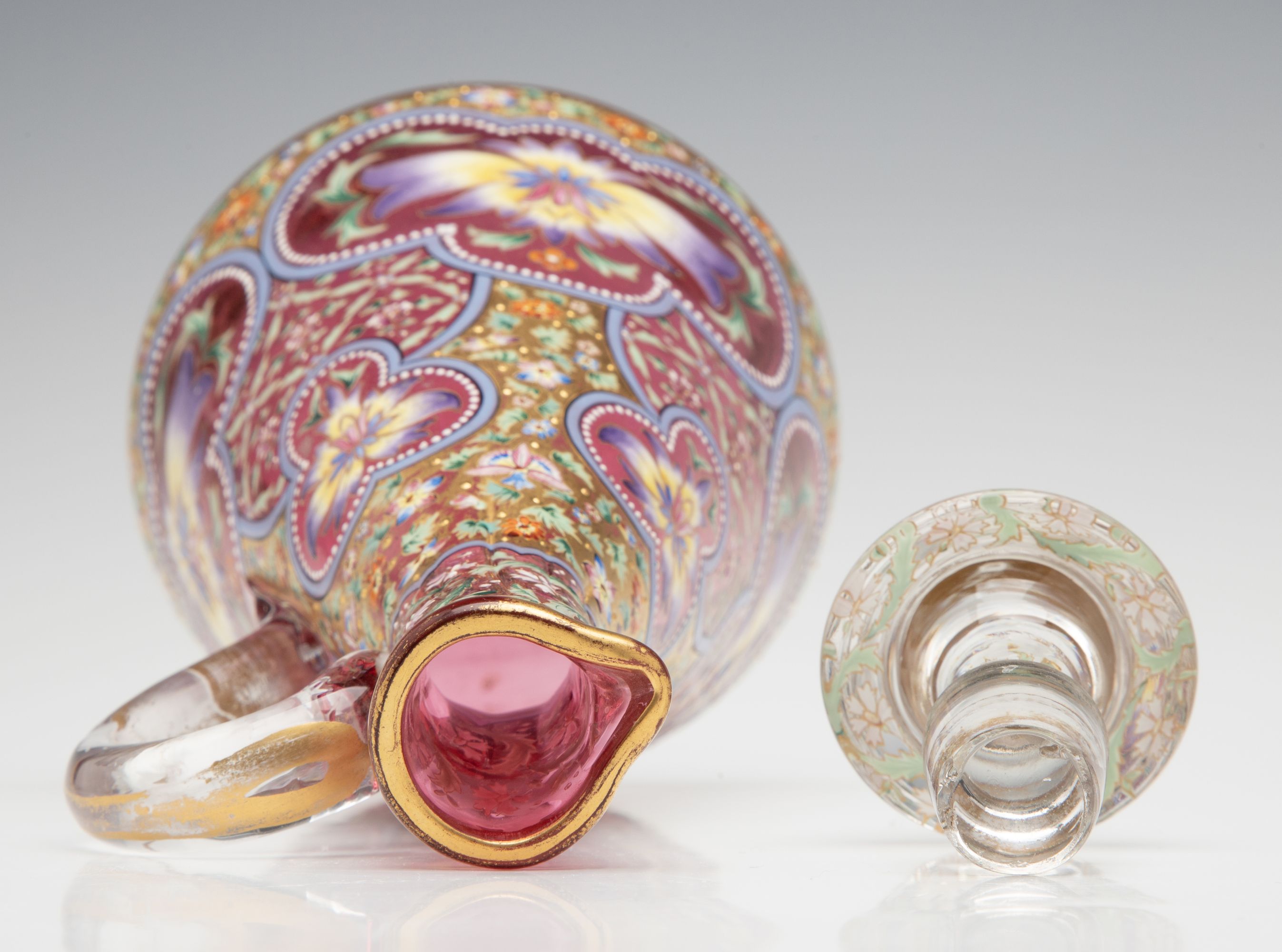 A LAVISHLY DECORATED CRANBERRY GLASS CRUET ATTR MOSER