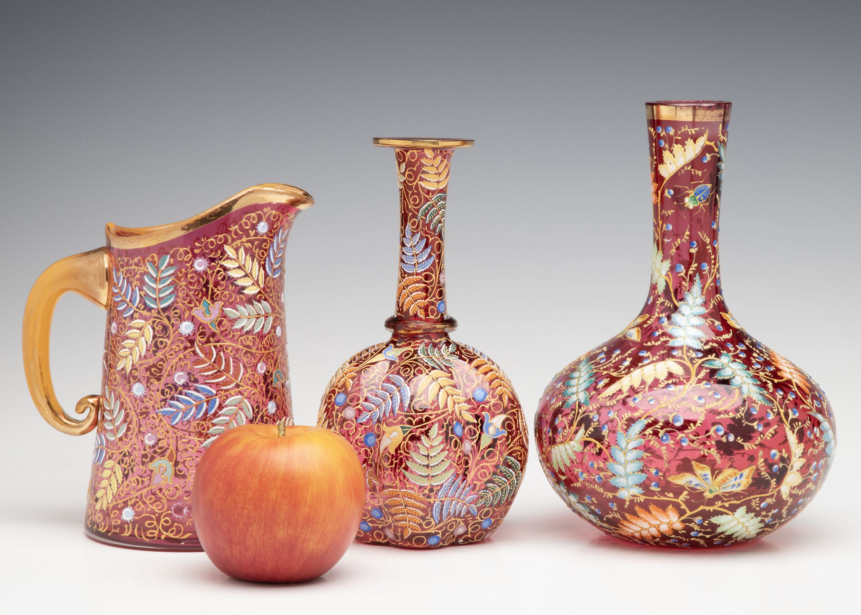 A GROUPING OF GILT AND ENAMEL DECORATED MOSER ART GLASS