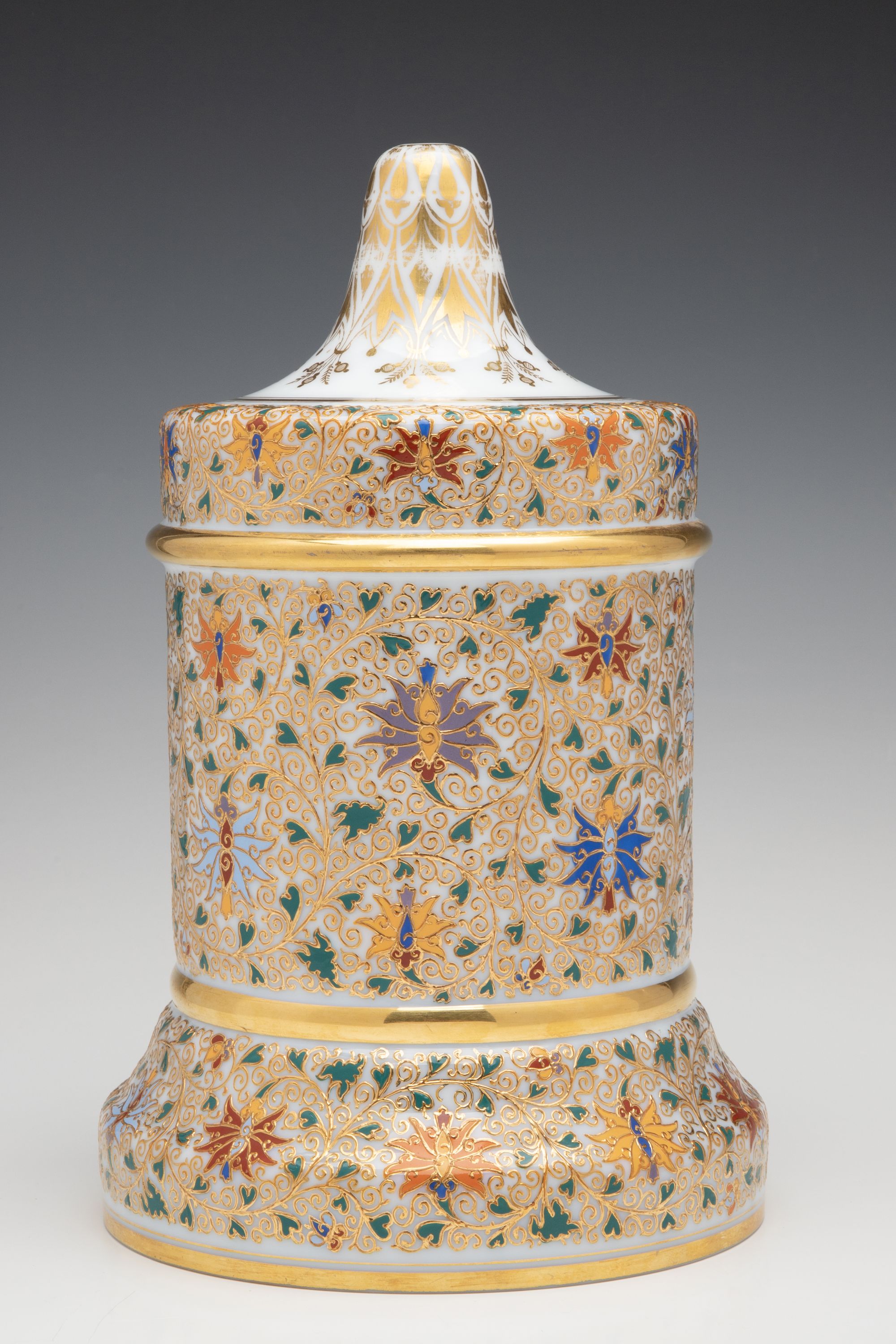 A LARGE HOLLOW MOSER GILT AND ENAMEL BELL SHAPE JAR