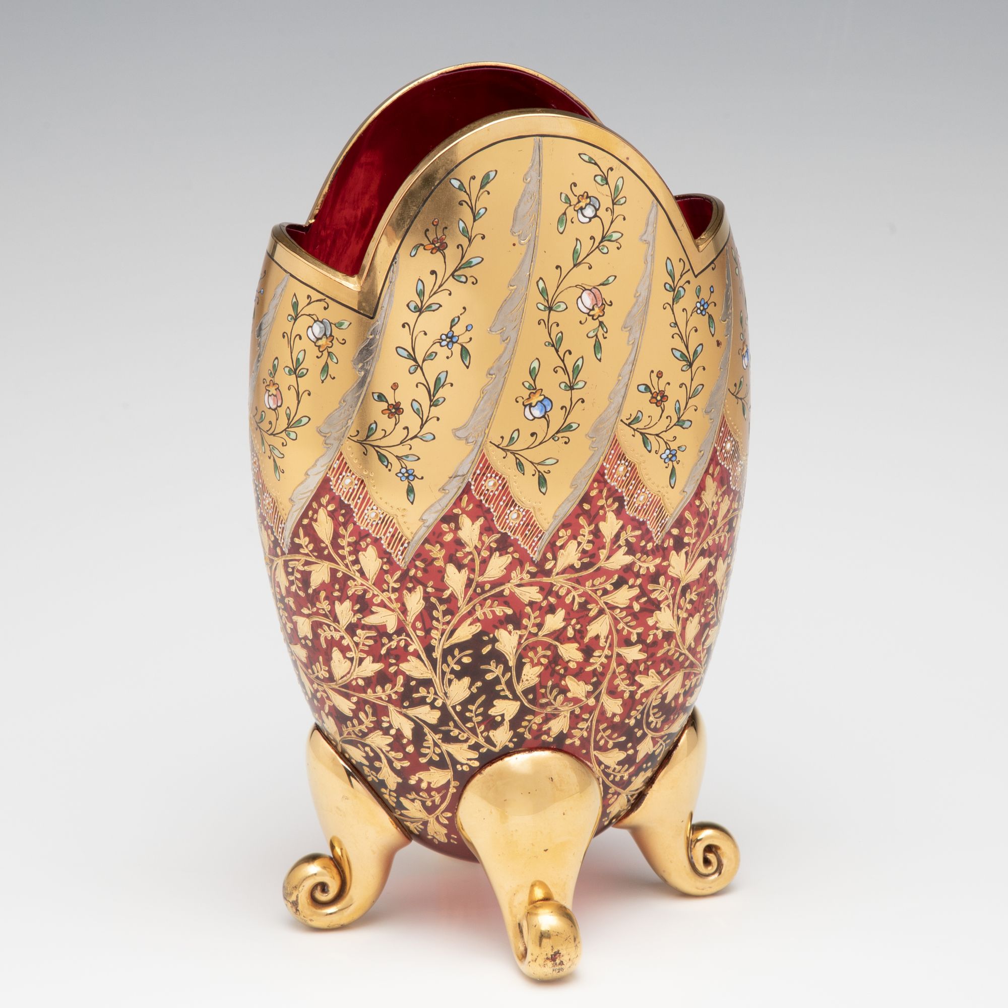 A VERY FINE MOSER GILT AND ENAMEL DEEP RUBY PILLOW VASE