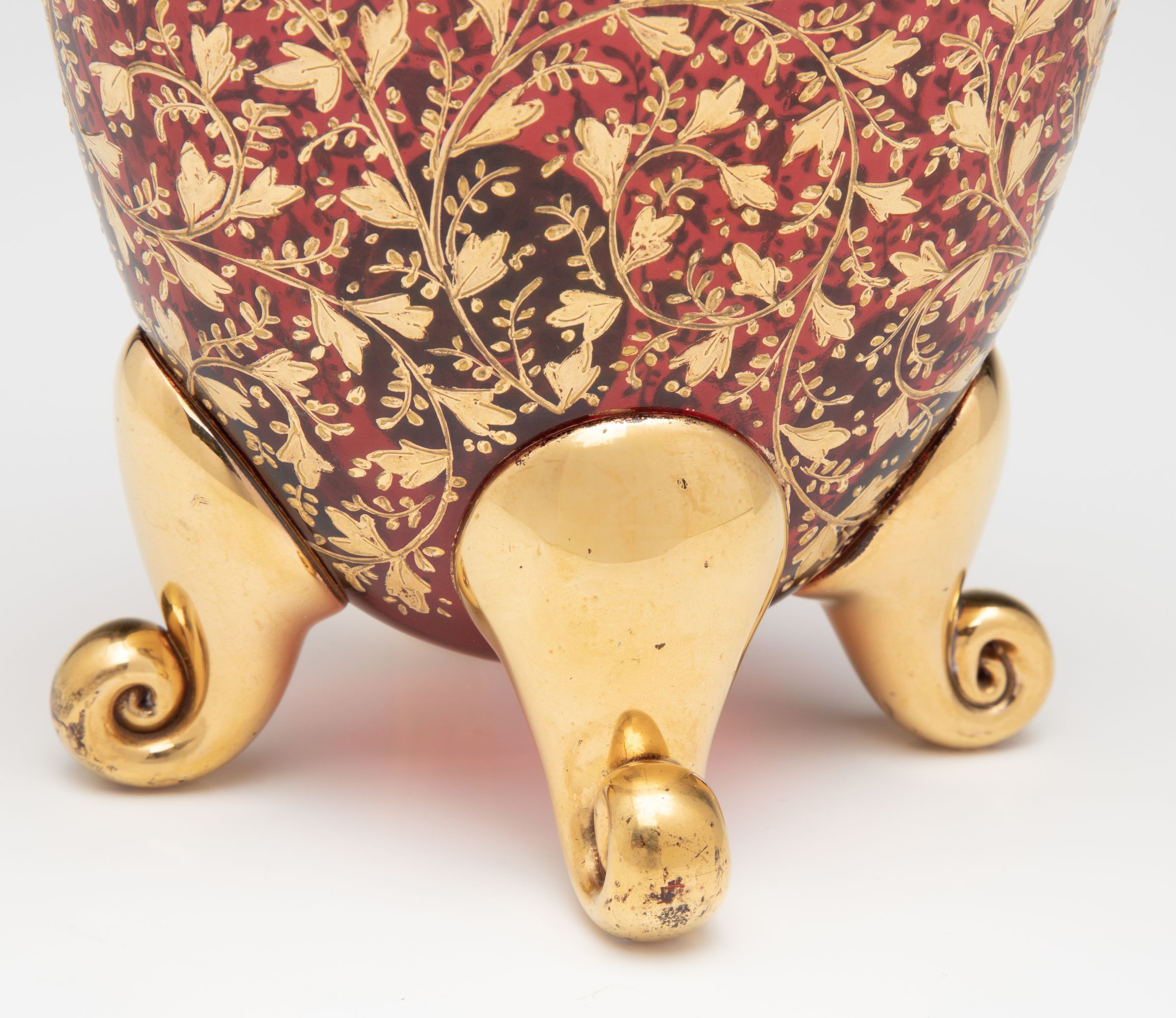 A VERY FINE MOSER GILT AND ENAMEL DEEP RUBY PILLOW VASE