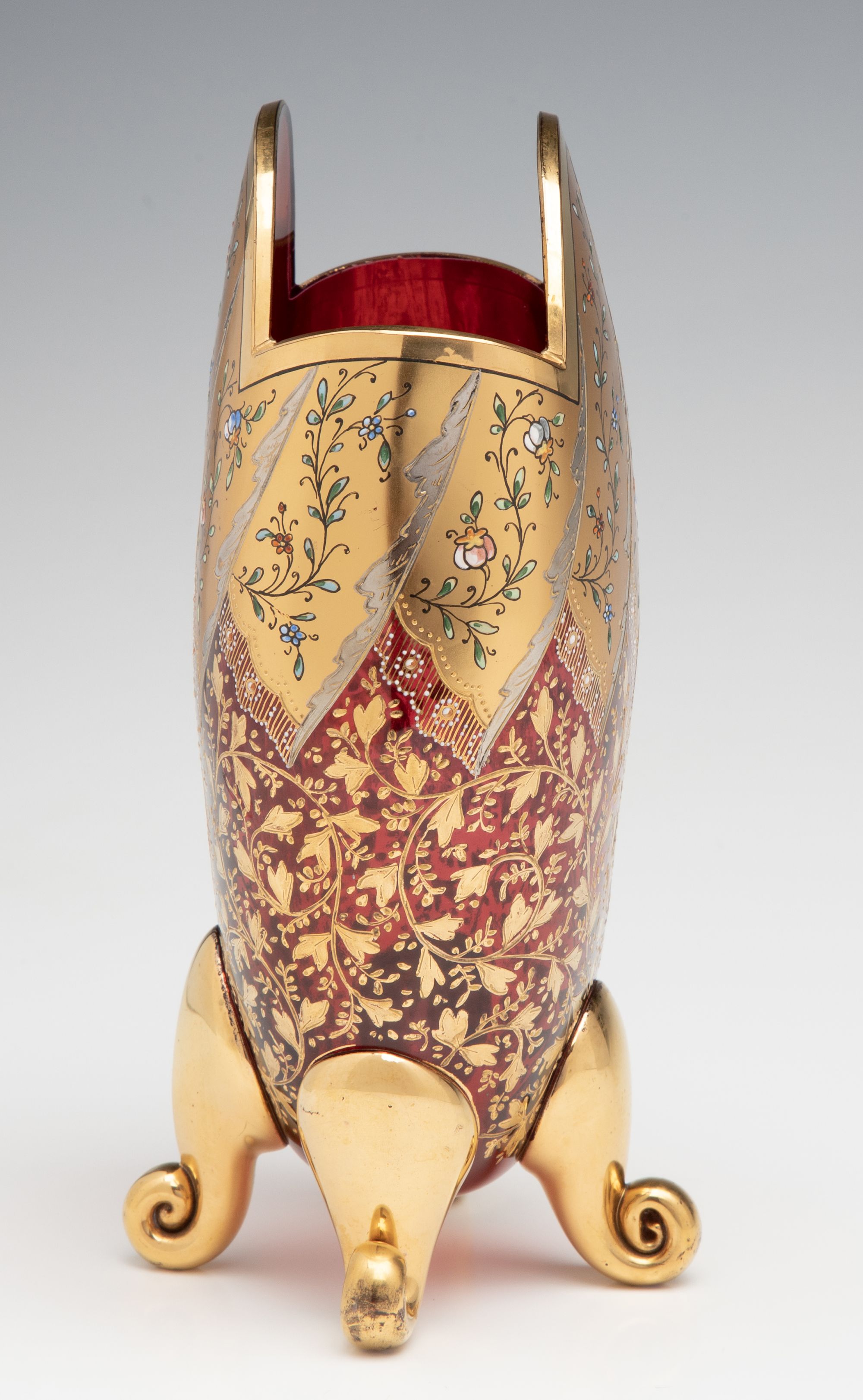 A VERY FINE MOSER GILT AND ENAMEL DEEP RUBY PILLOW VASE