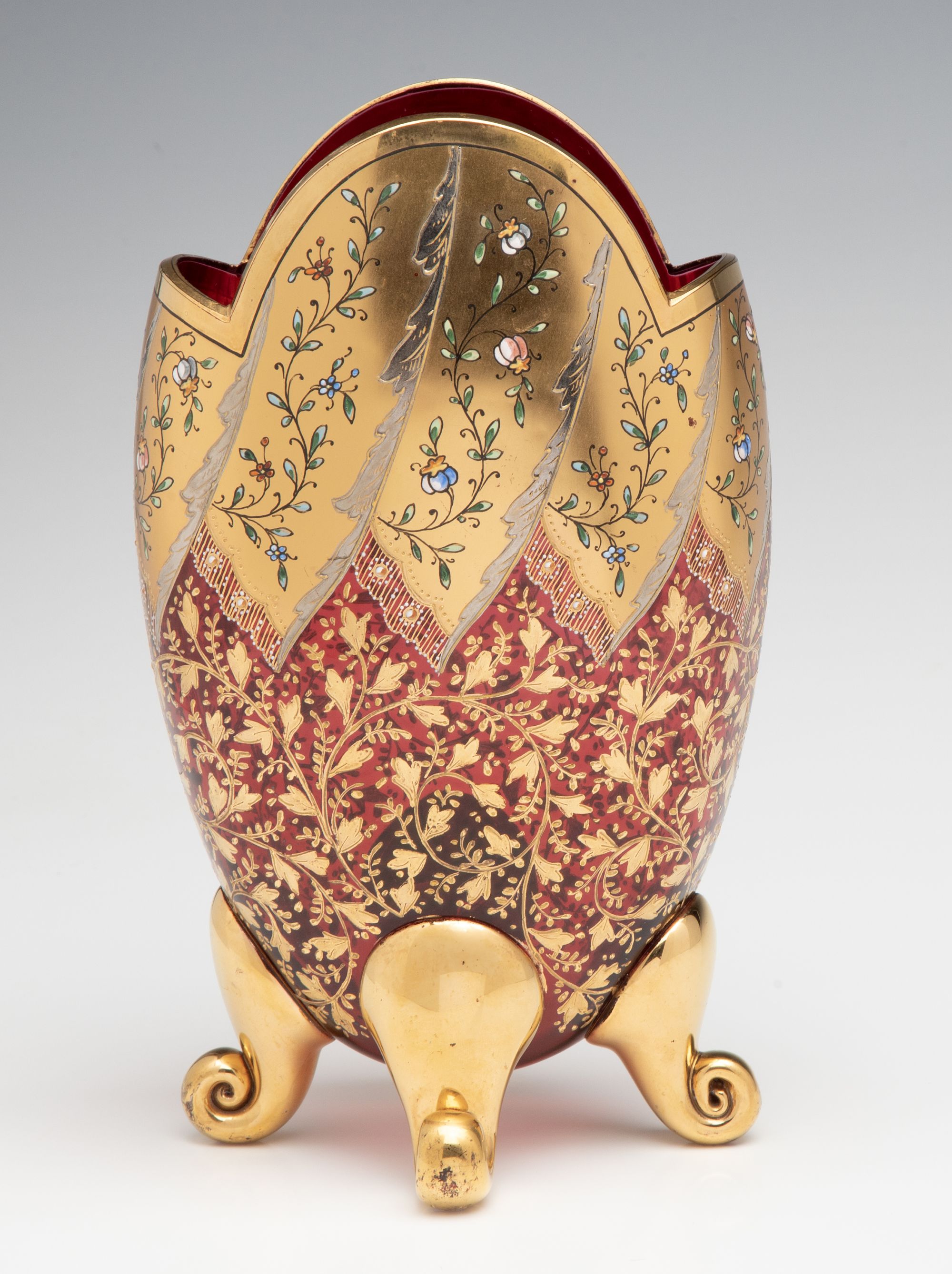 A VERY FINE MOSER GILT AND ENAMEL DEEP RUBY PILLOW VASE