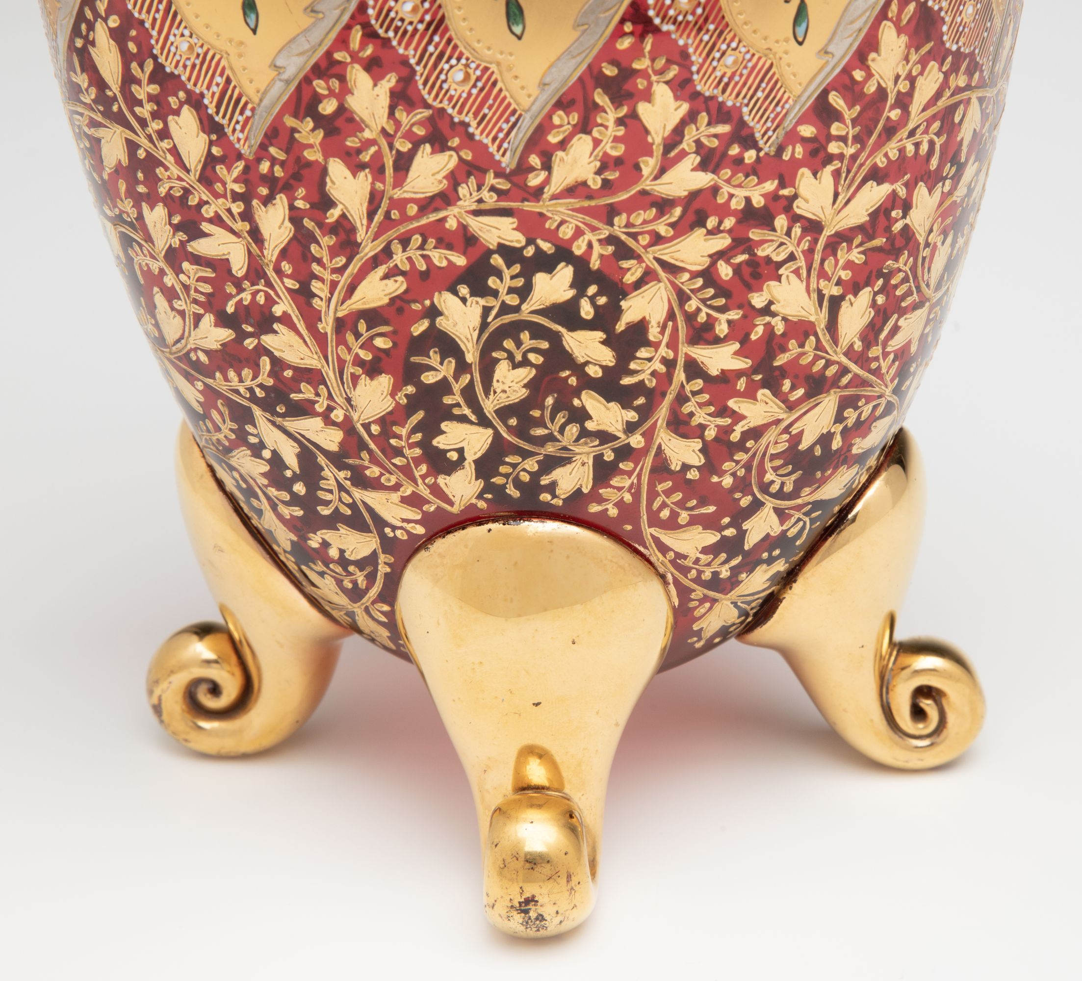 A VERY FINE MOSER GILT AND ENAMEL DEEP RUBY PILLOW VASE