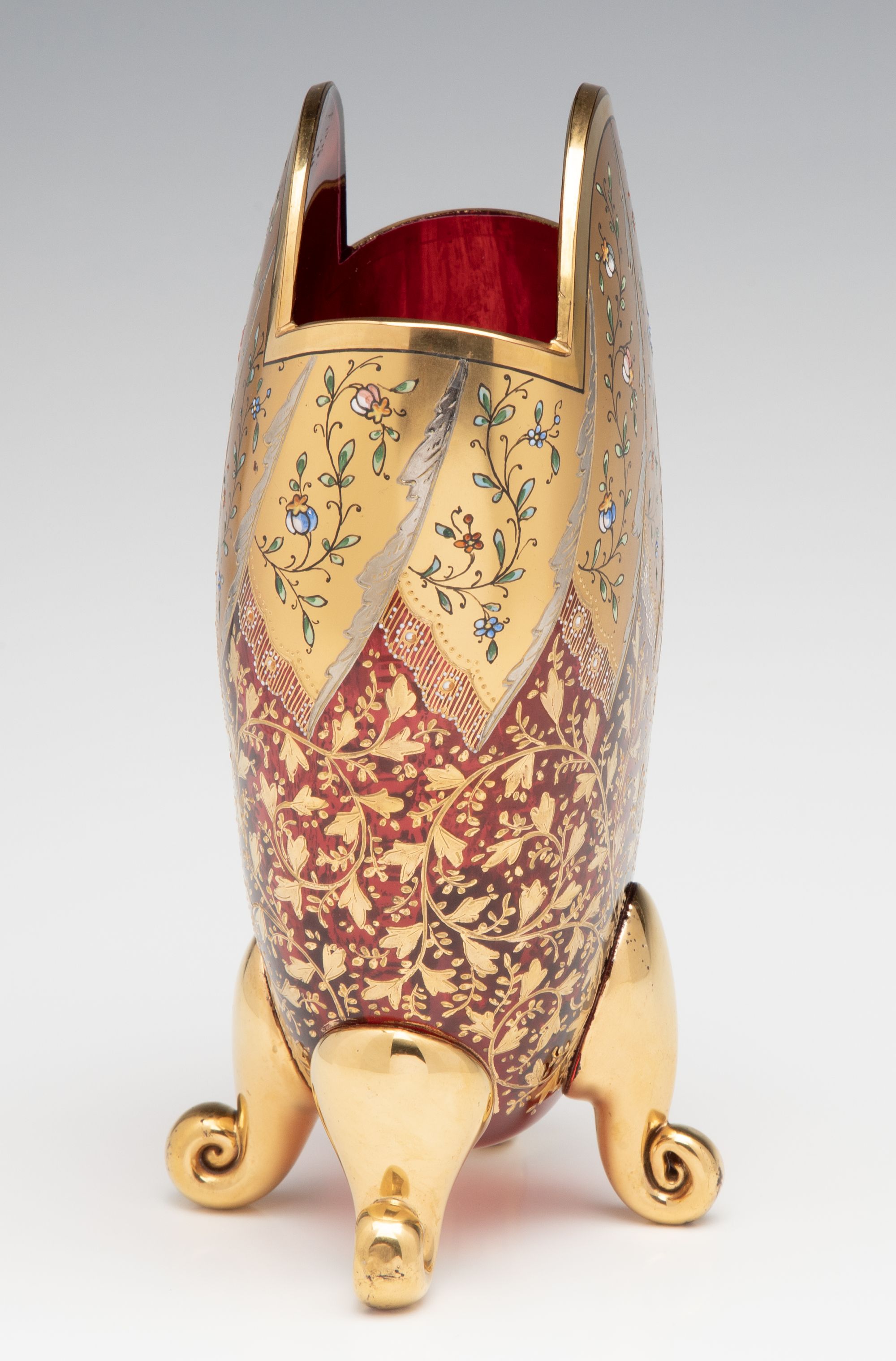 A VERY FINE MOSER GILT AND ENAMEL DEEP RUBY PILLOW VASE