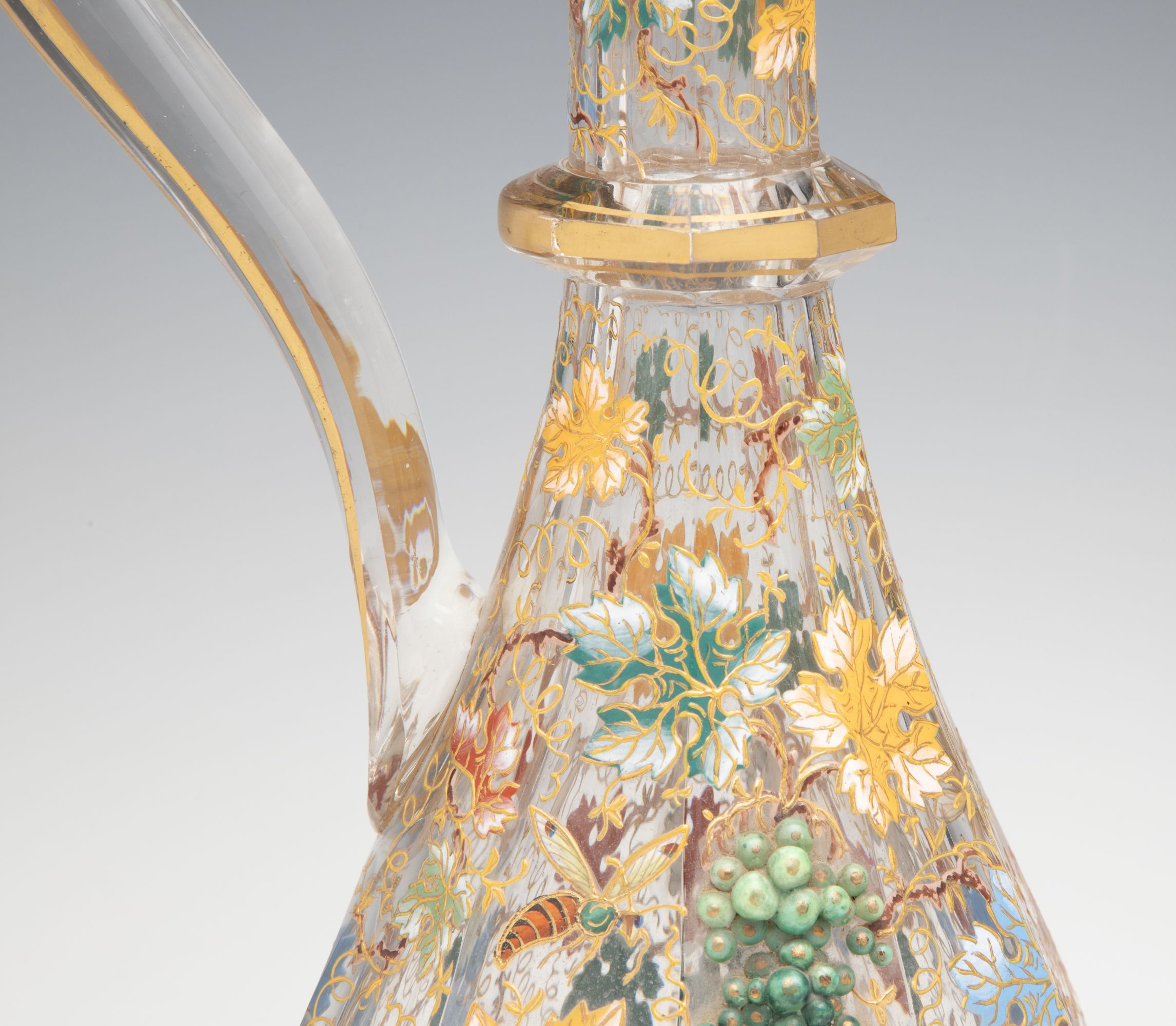 A MOSER CUT AND ENAMEL CRYSTAL EWER WITH APPLIED GRAPES