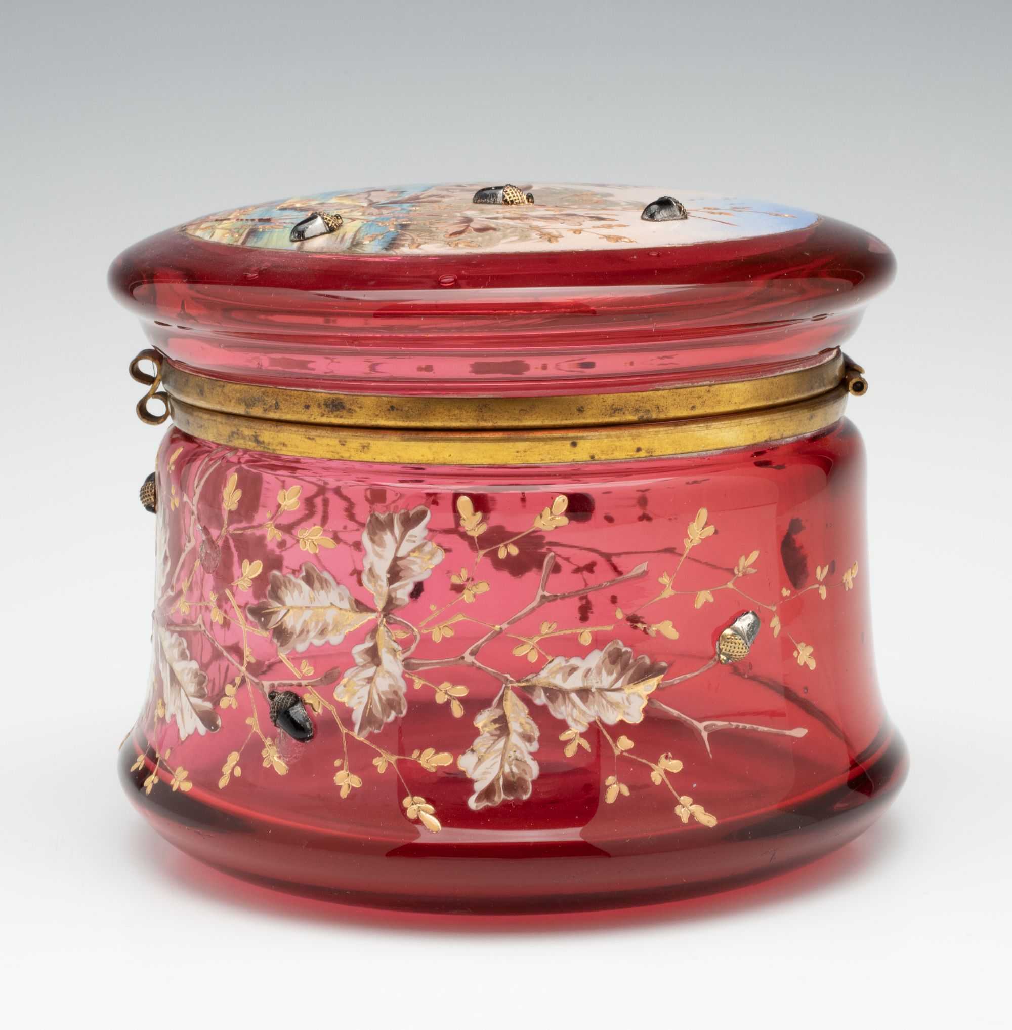 AN UNUSUAL BOHEMIAN ART GLASS POWDER BOX WITH ACORNS