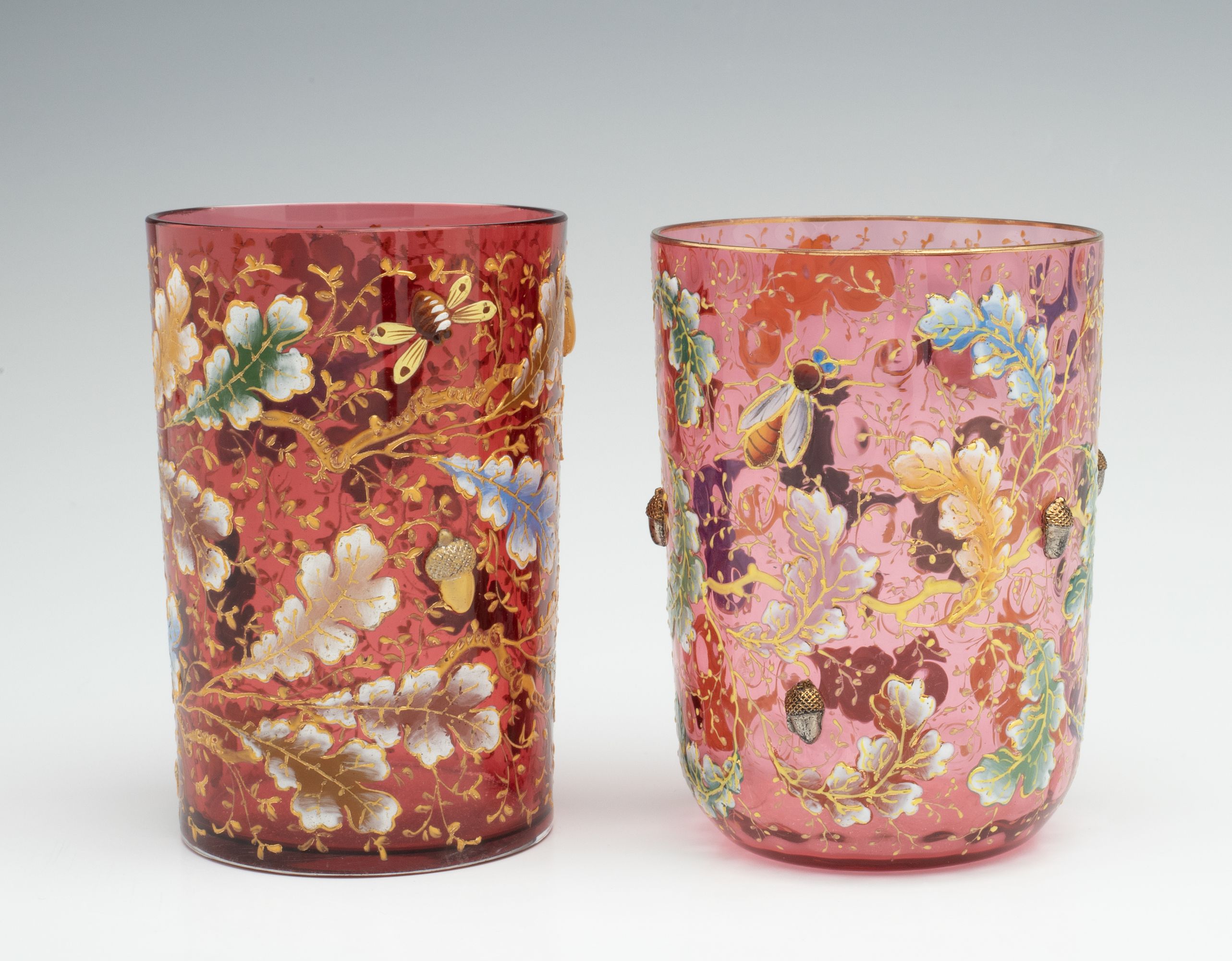 TWO MOSER CRANBERRY ART GLASS TUMBLERS WITH ACORNS