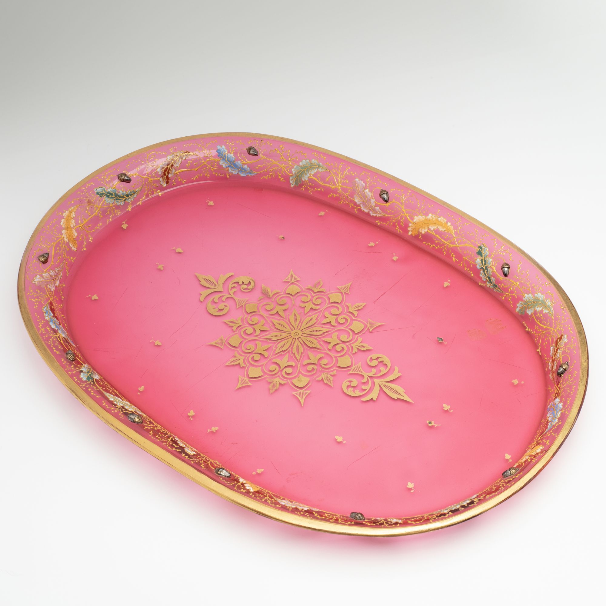 A MOSER CRANBERRY TRAY WITH OAK BOUGHS AND ACORNS