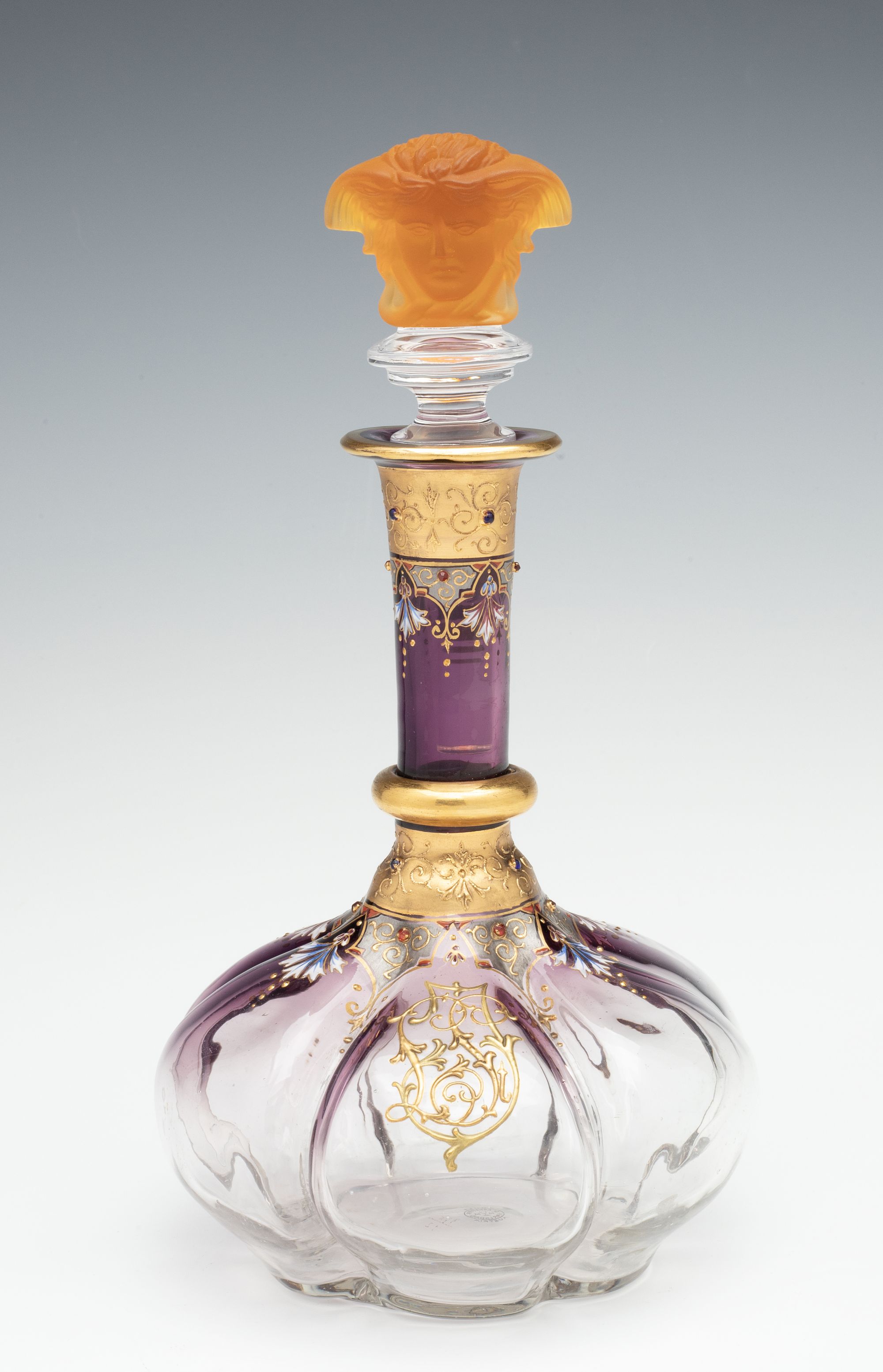 A JEWELED BOHEMIAN GLASS DECANTER AND FOUR STEMS