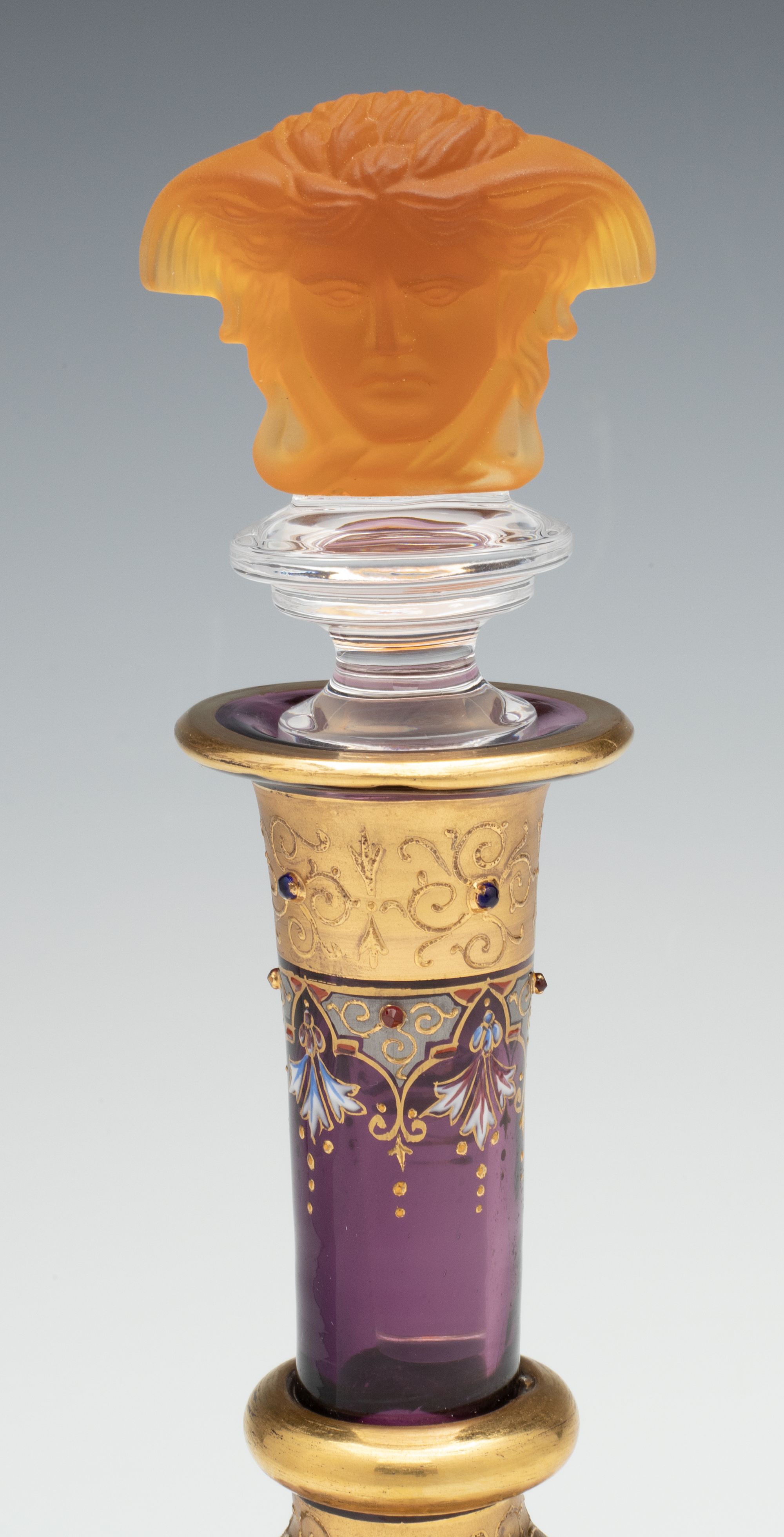 A JEWELED BOHEMIAN GLASS DECANTER AND FOUR STEMS