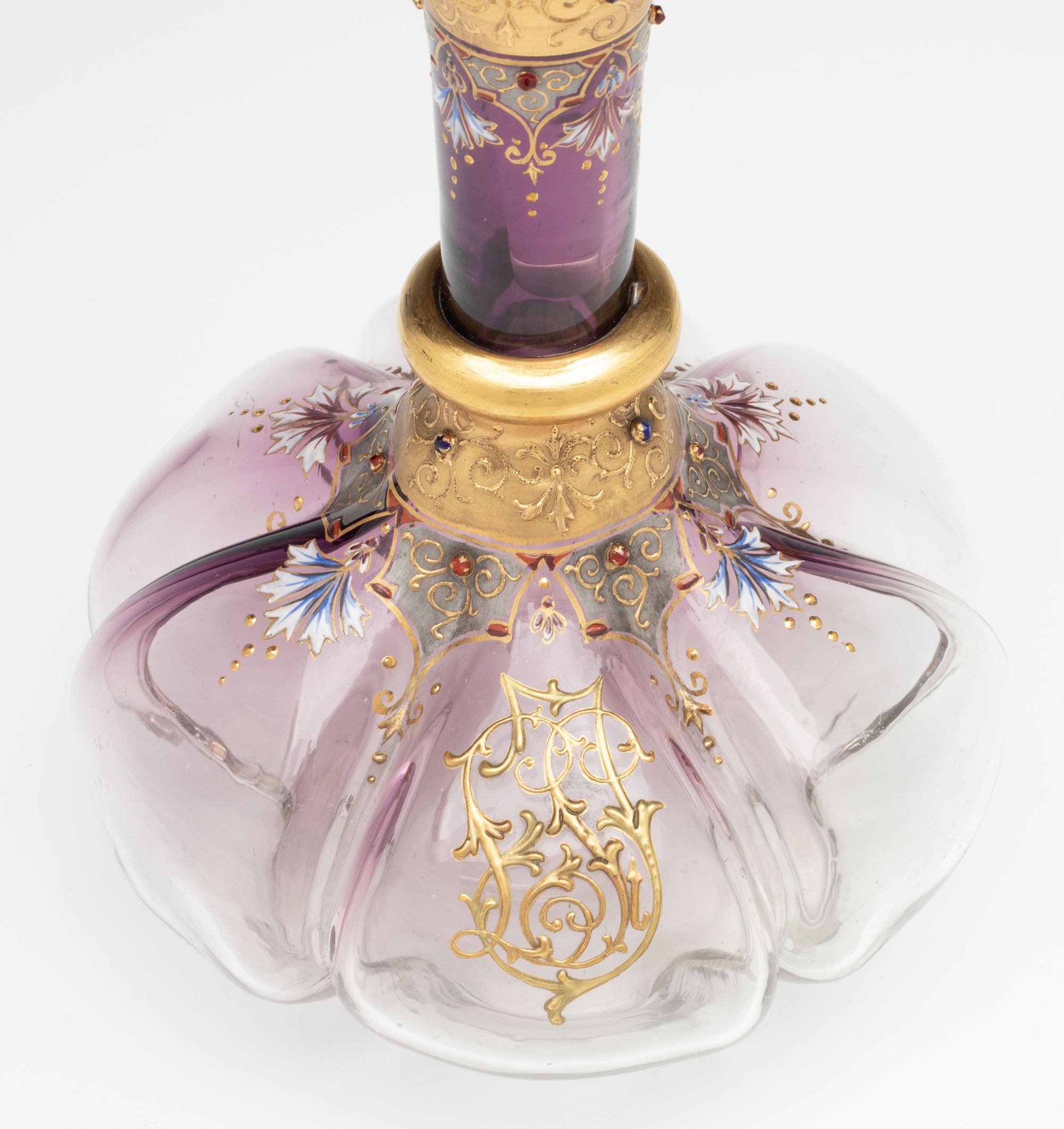 A JEWELED BOHEMIAN GLASS DECANTER AND FOUR STEMS