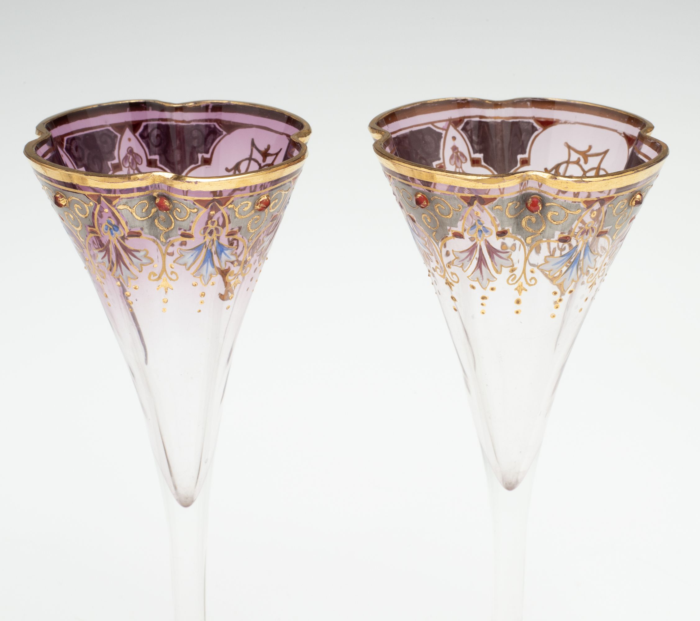 A JEWELED BOHEMIAN GLASS DECANTER AND FOUR STEMS