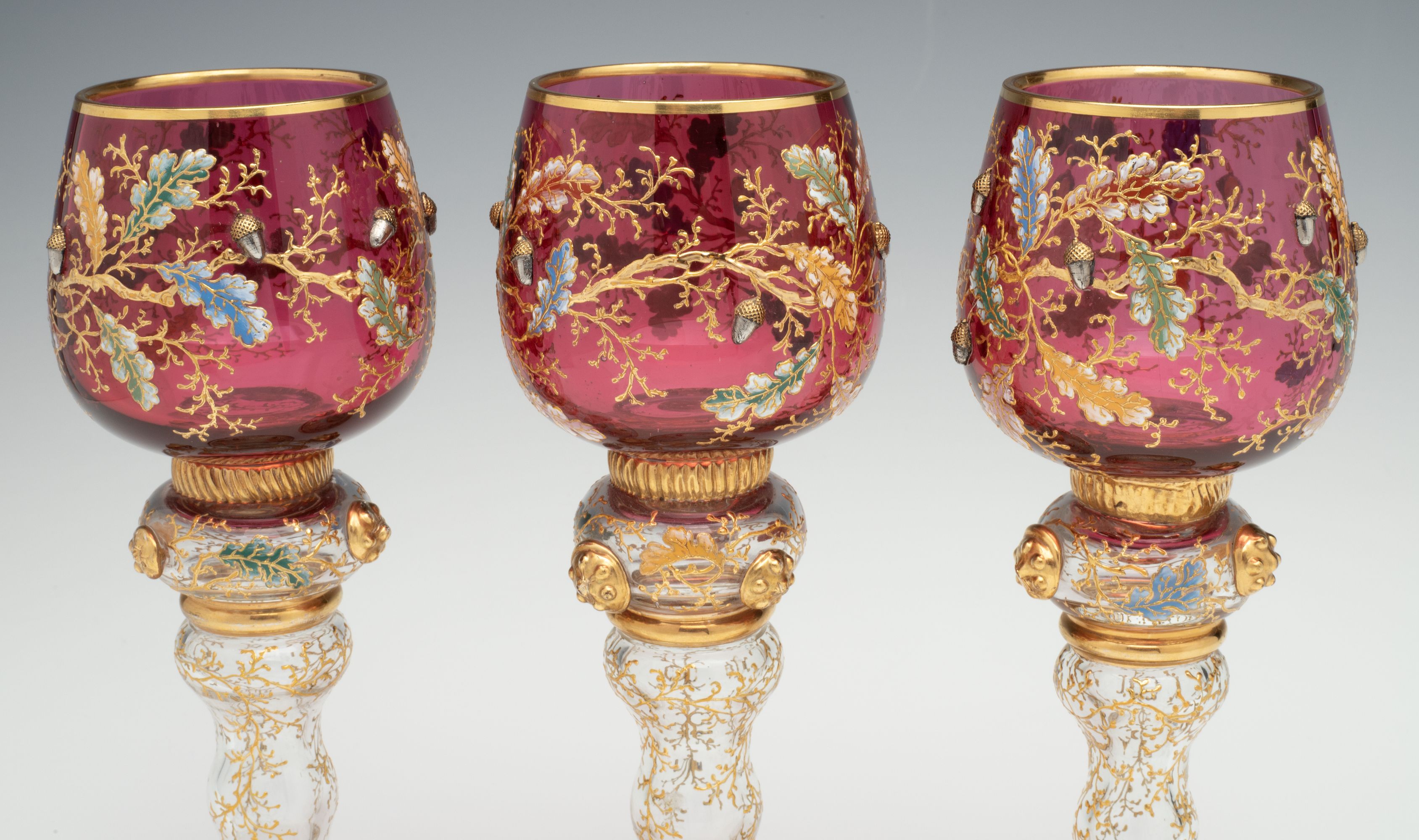 LARGE MOSER GILT AND ENAMEL WINE GOBLETS WITH ACORNS