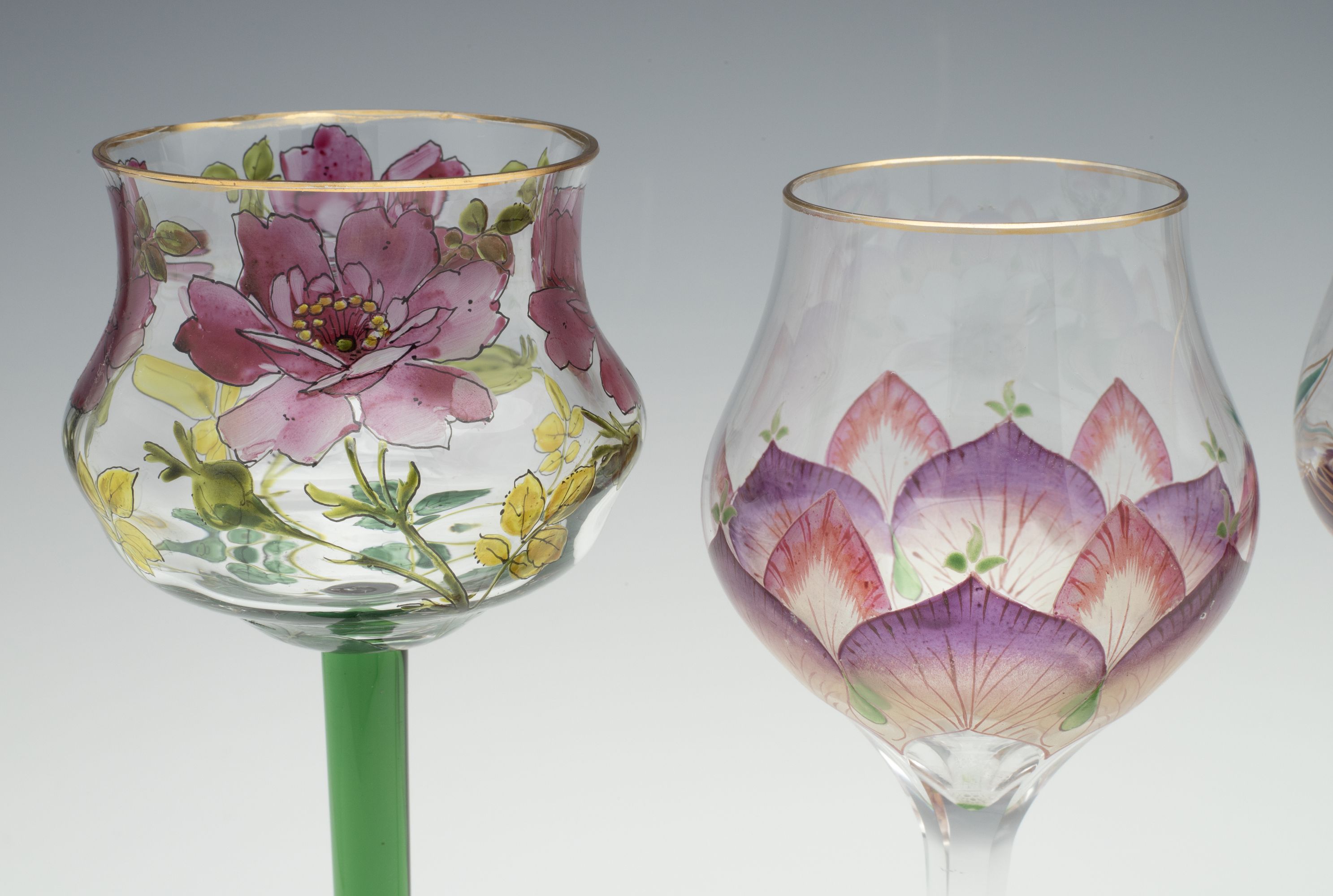 THREE DIFFERENT CONTINENTAL ART GLASS STEMS WITH ENAMEL