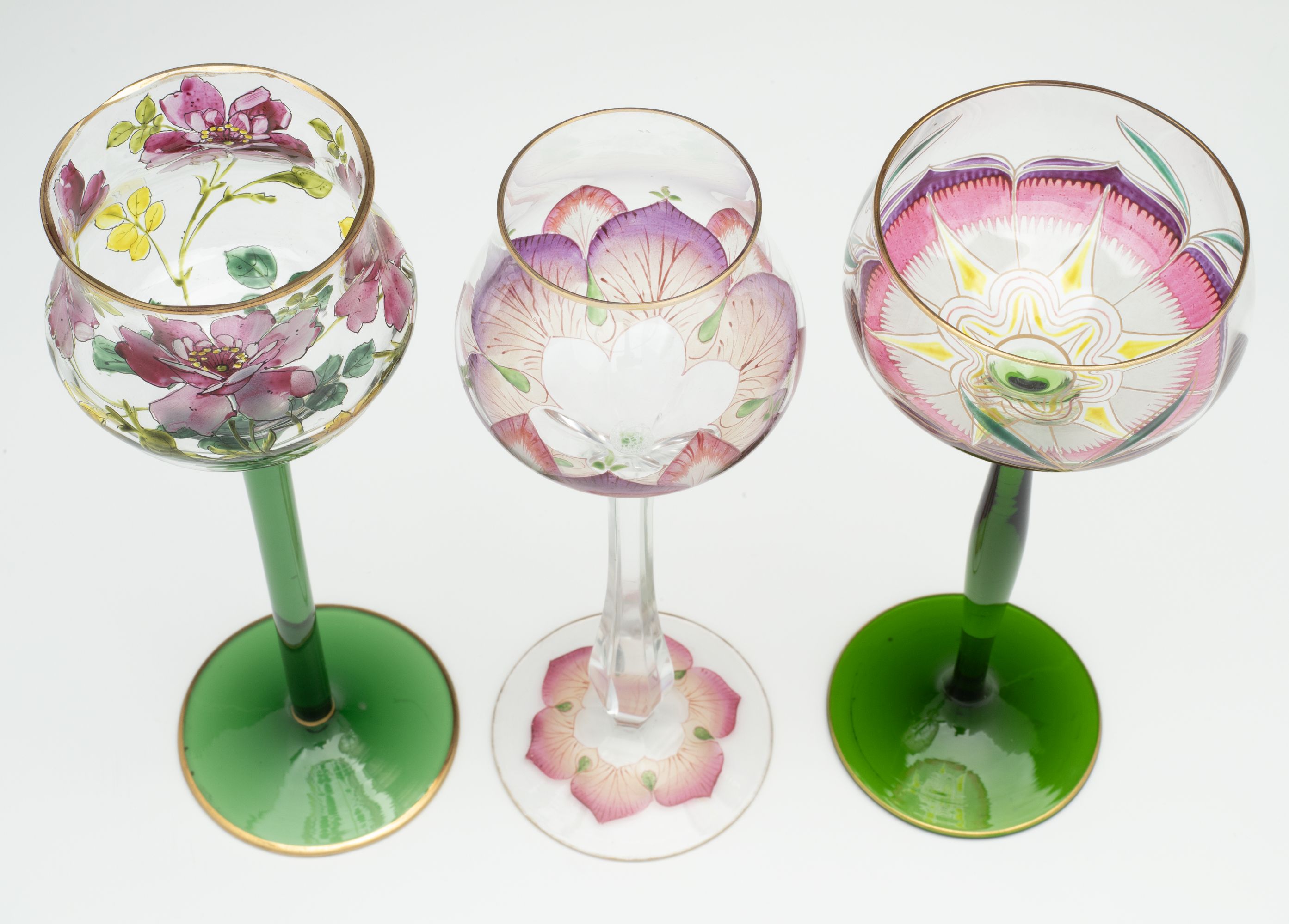 THREE DIFFERENT CONTINENTAL ART GLASS STEMS WITH ENAMEL