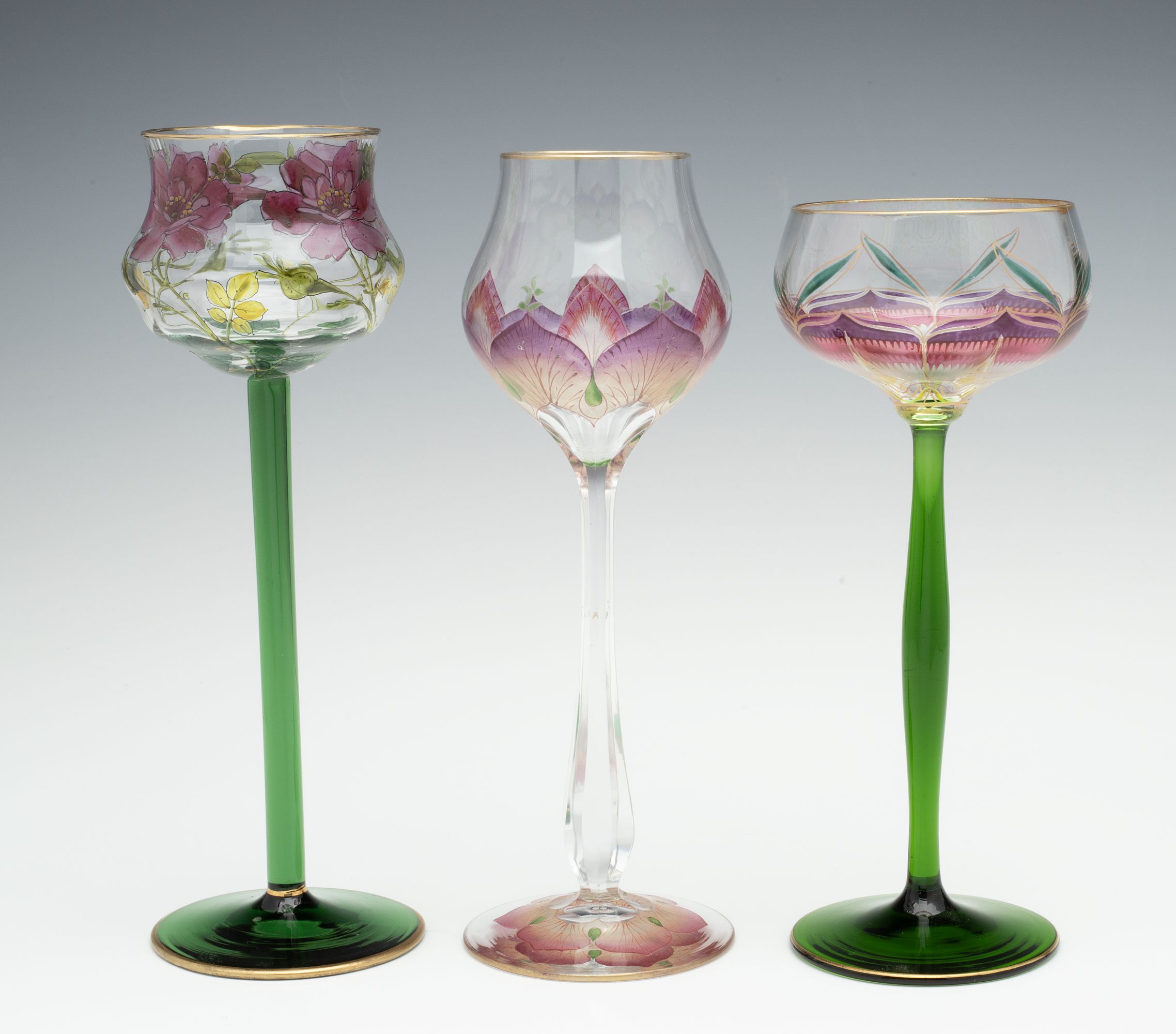 THREE DIFFERENT CONTINENTAL ART GLASS STEMS WITH ENAMEL