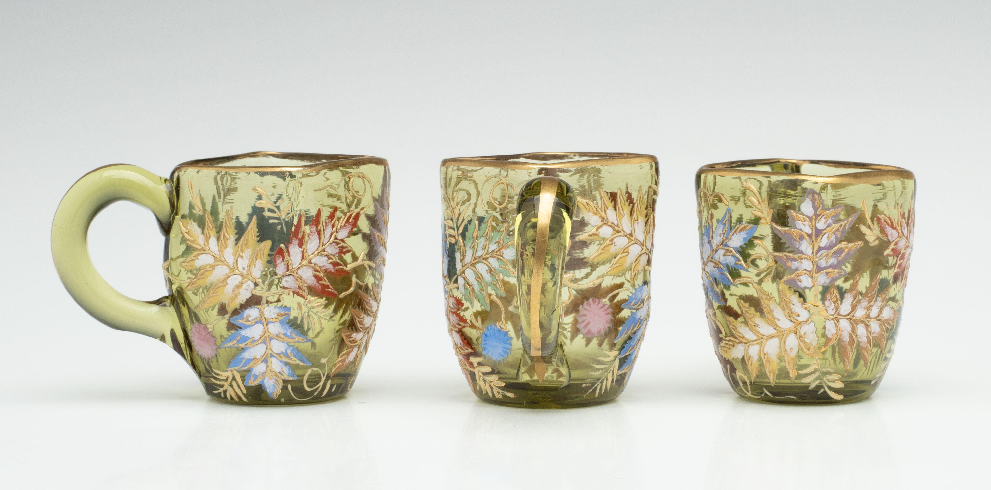 A MOSER GILT AND ENAMEL JUG, TRAY, AND MINIATURE CUPS