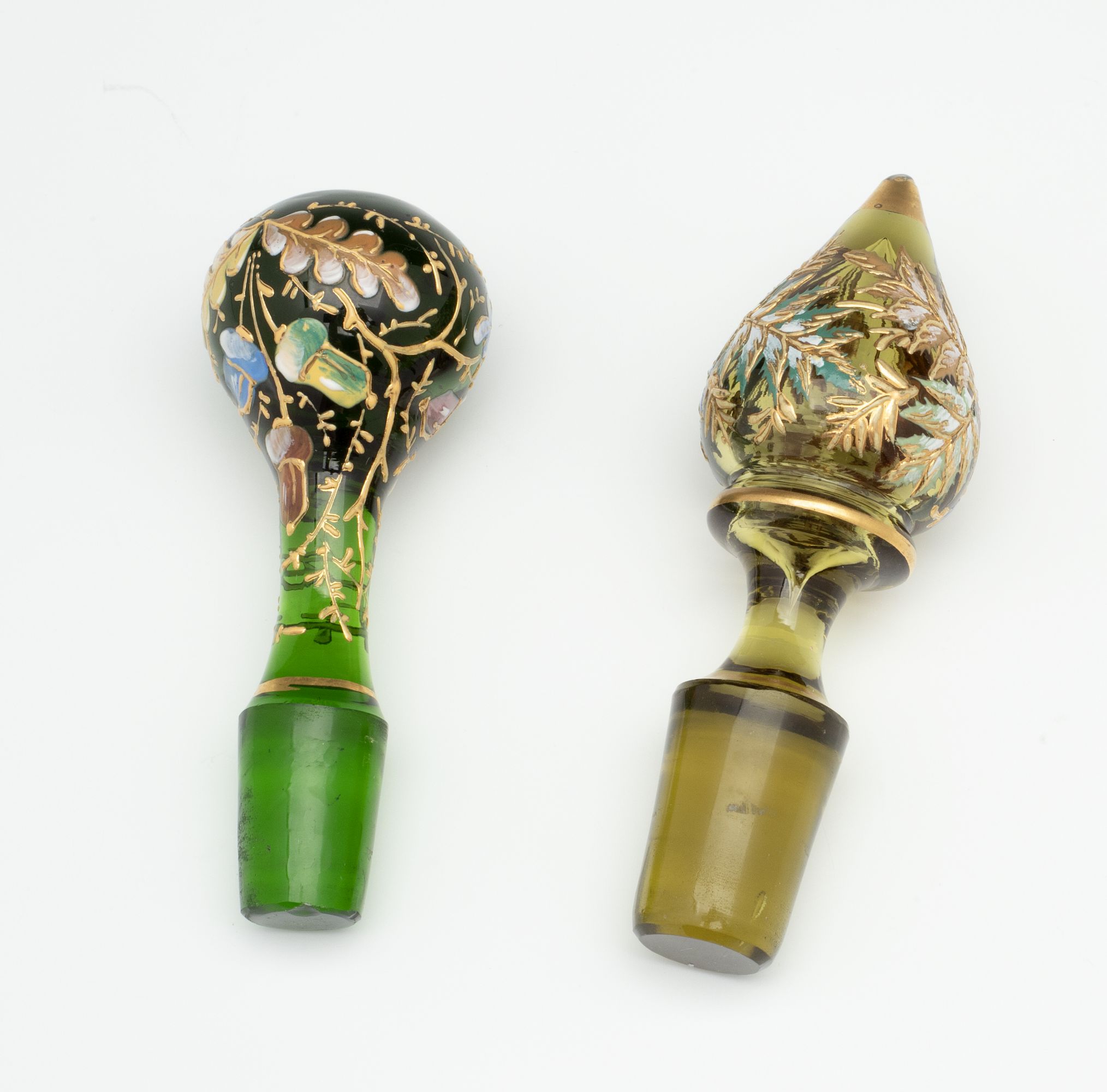 TWO MOSER GILT AND ENAMEL ART GLASS CRUETS