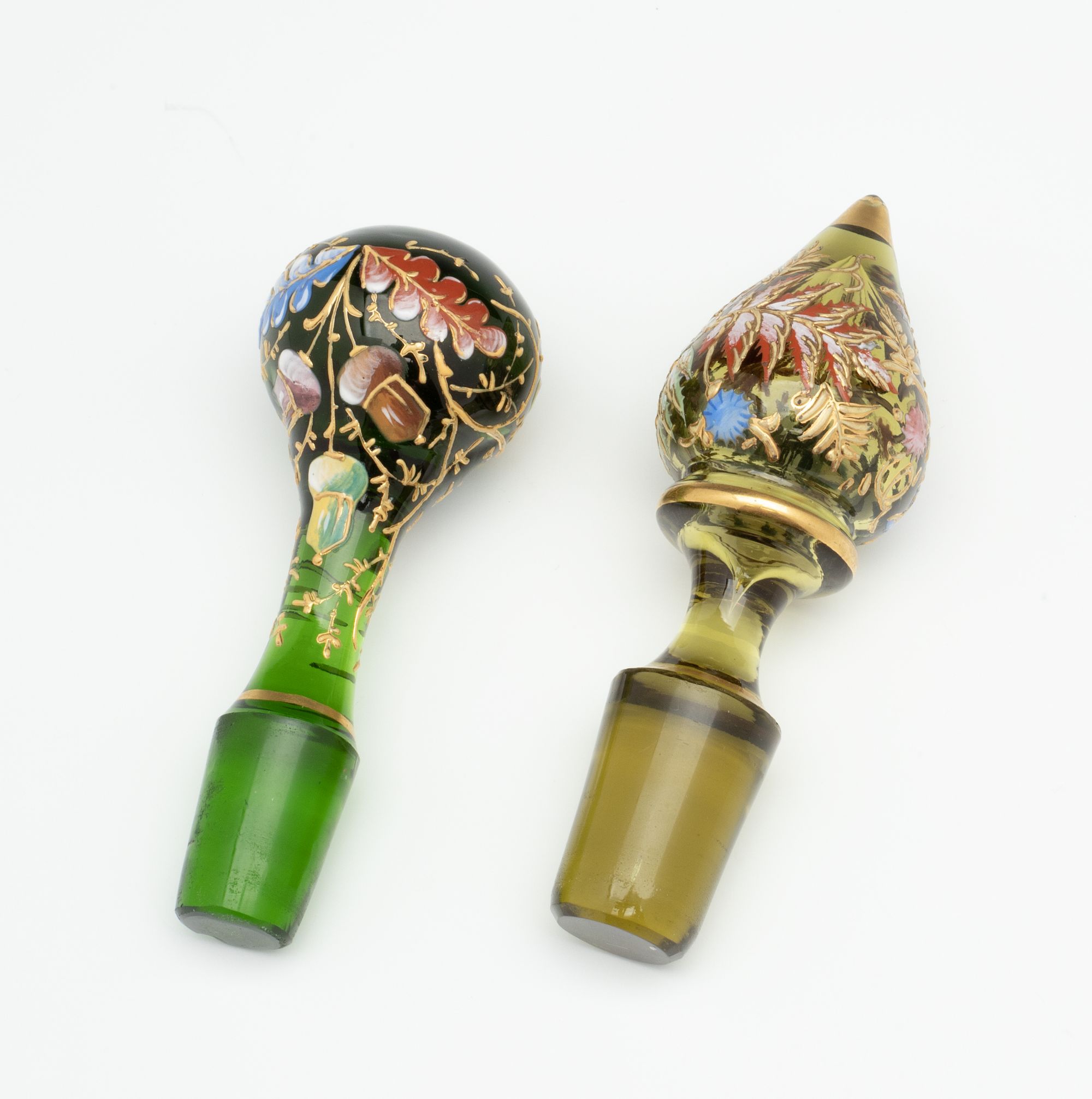 TWO MOSER GILT AND ENAMEL ART GLASS CRUETS