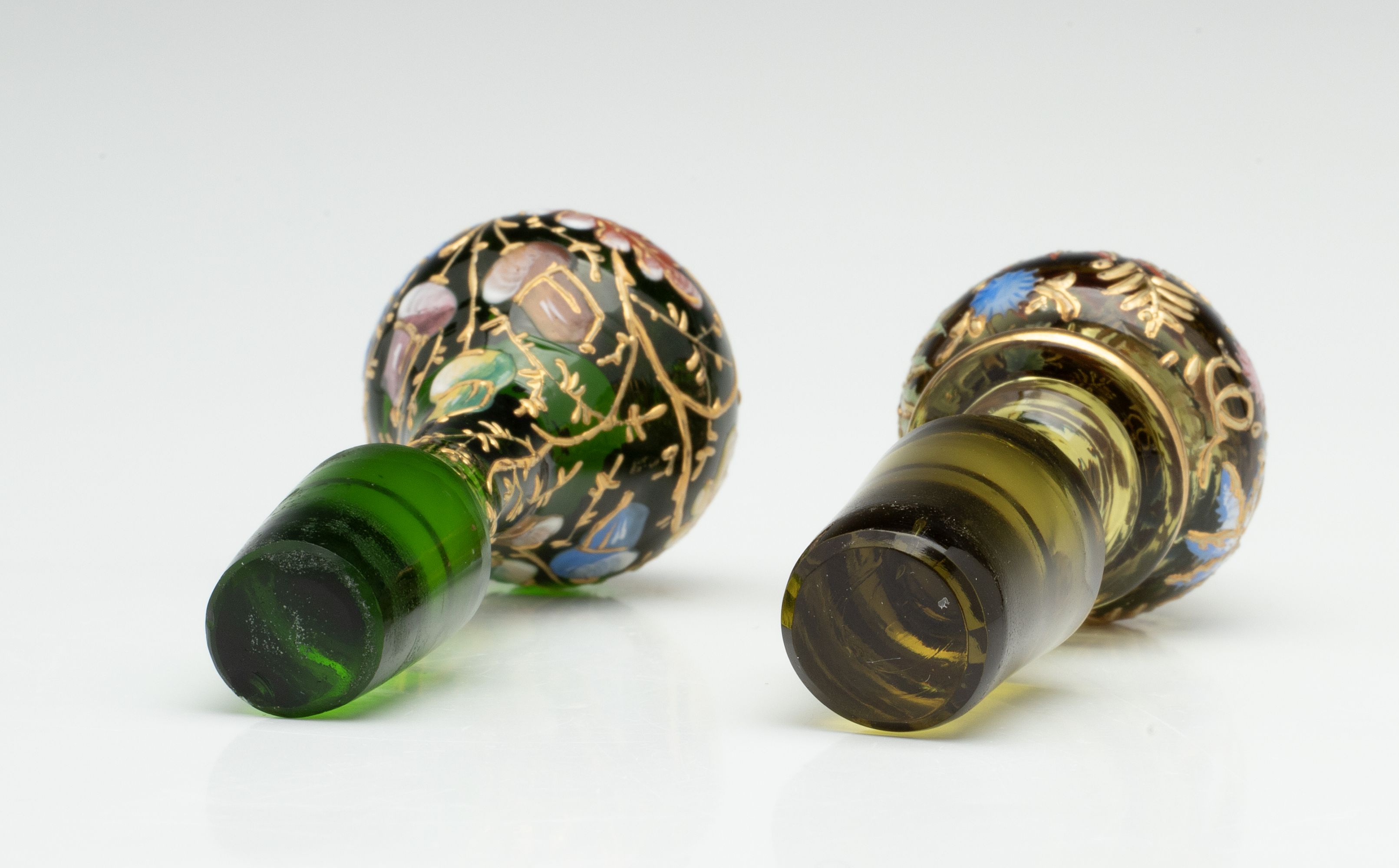 TWO MOSER GILT AND ENAMEL ART GLASS CRUETS