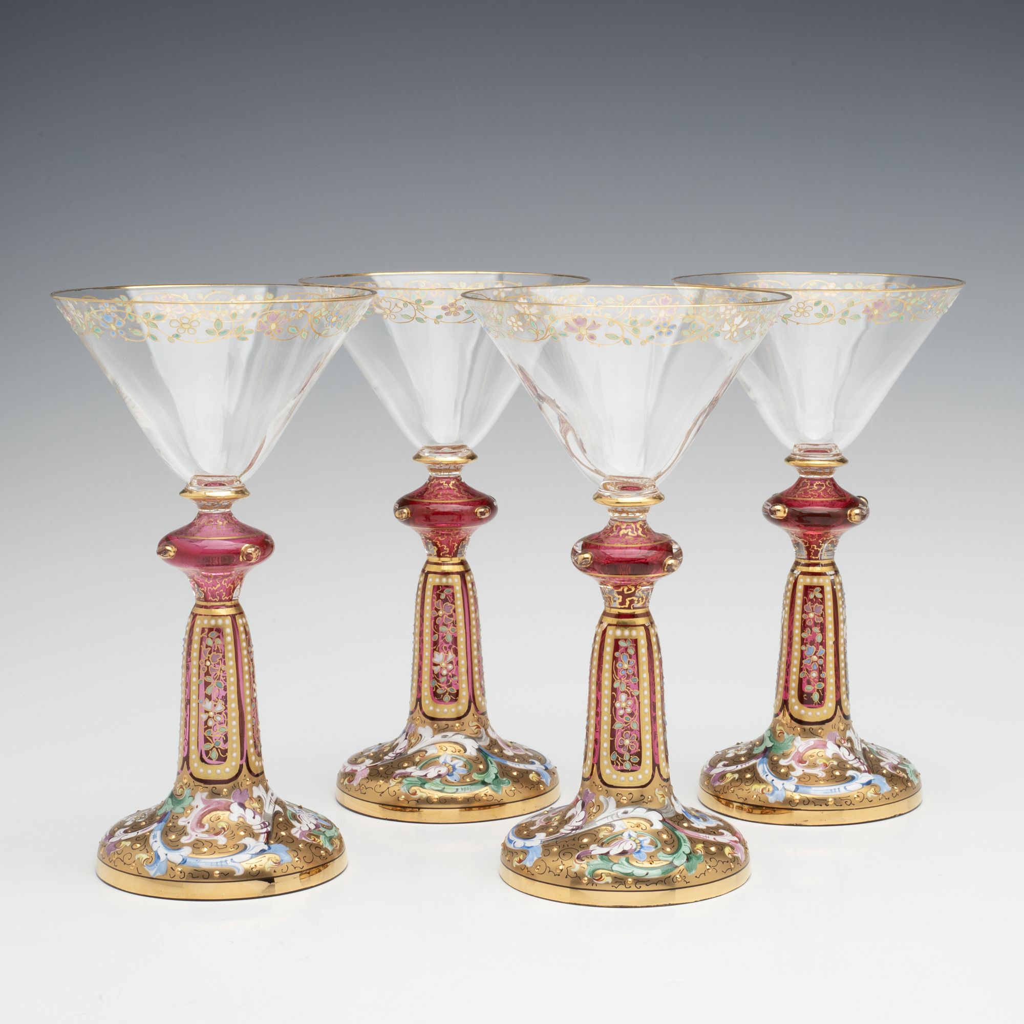 FOUR VERY UNUSUAL GILT AND ENAMEL MOSER WINE GOBLETS