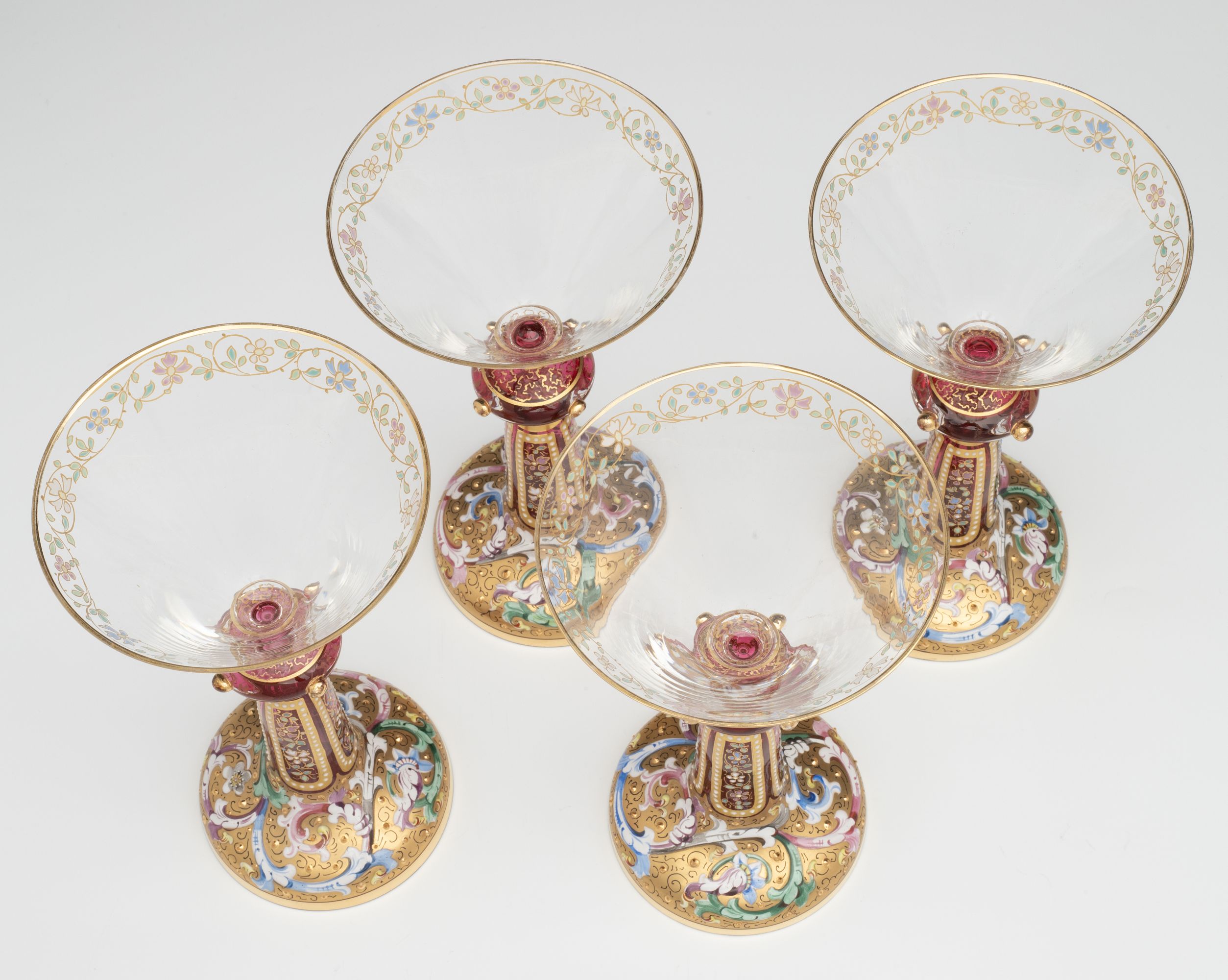 FOUR VERY UNUSUAL GILT AND ENAMEL MOSER WINE GOBLETS