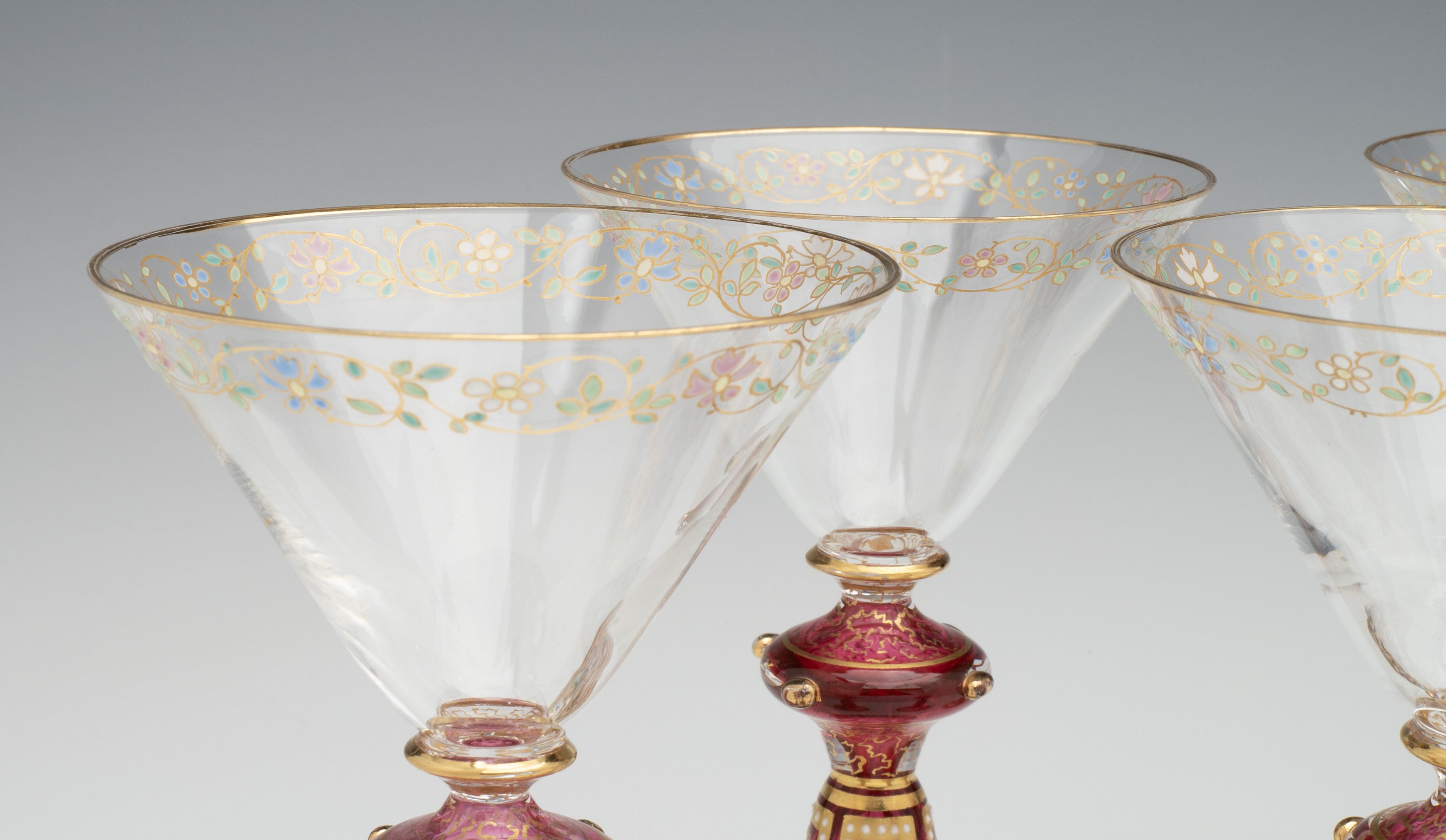 FOUR VERY UNUSUAL GILT AND ENAMEL MOSER WINE GOBLETS