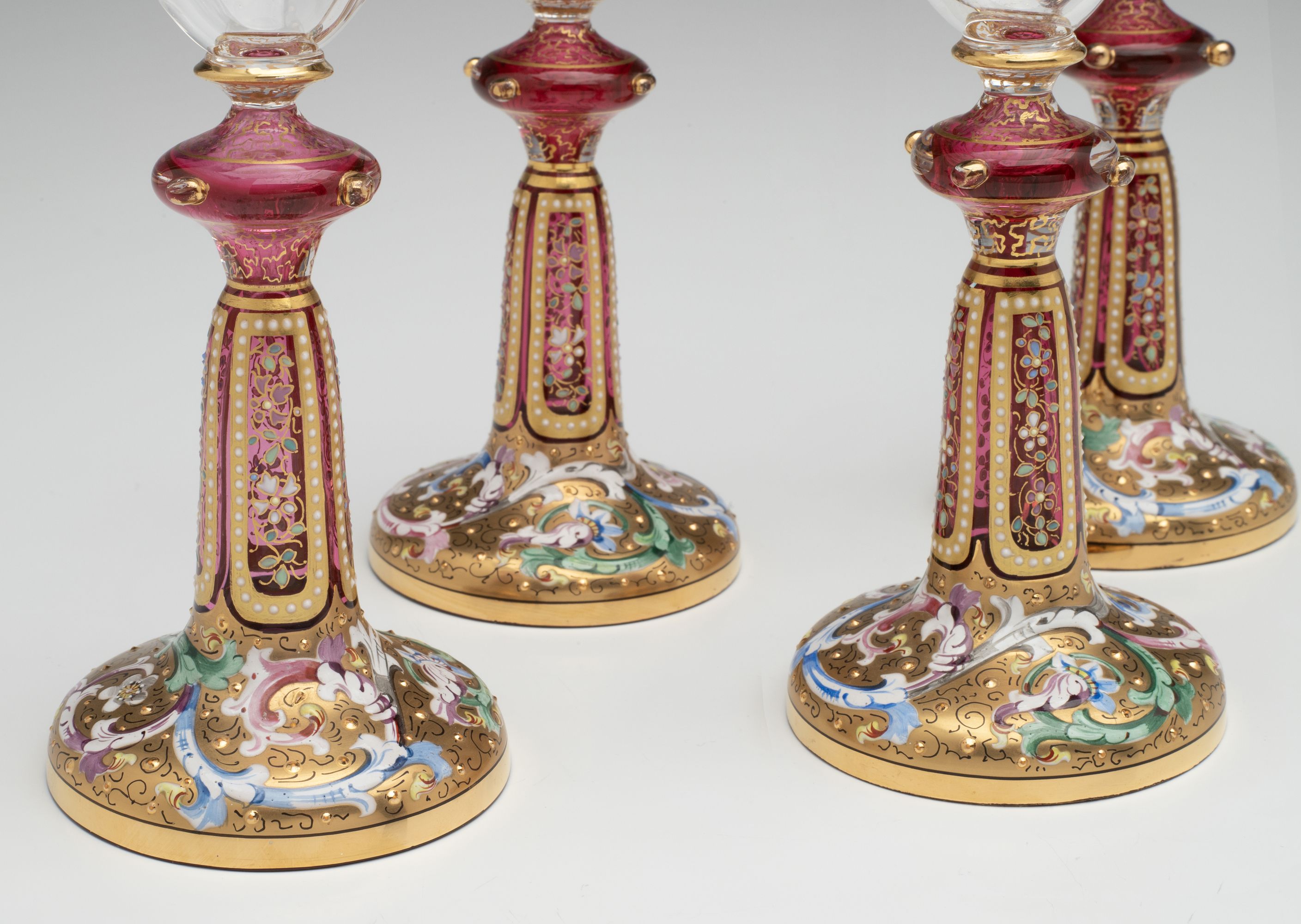 FOUR VERY UNUSUAL GILT AND ENAMEL MOSER WINE GOBLETS