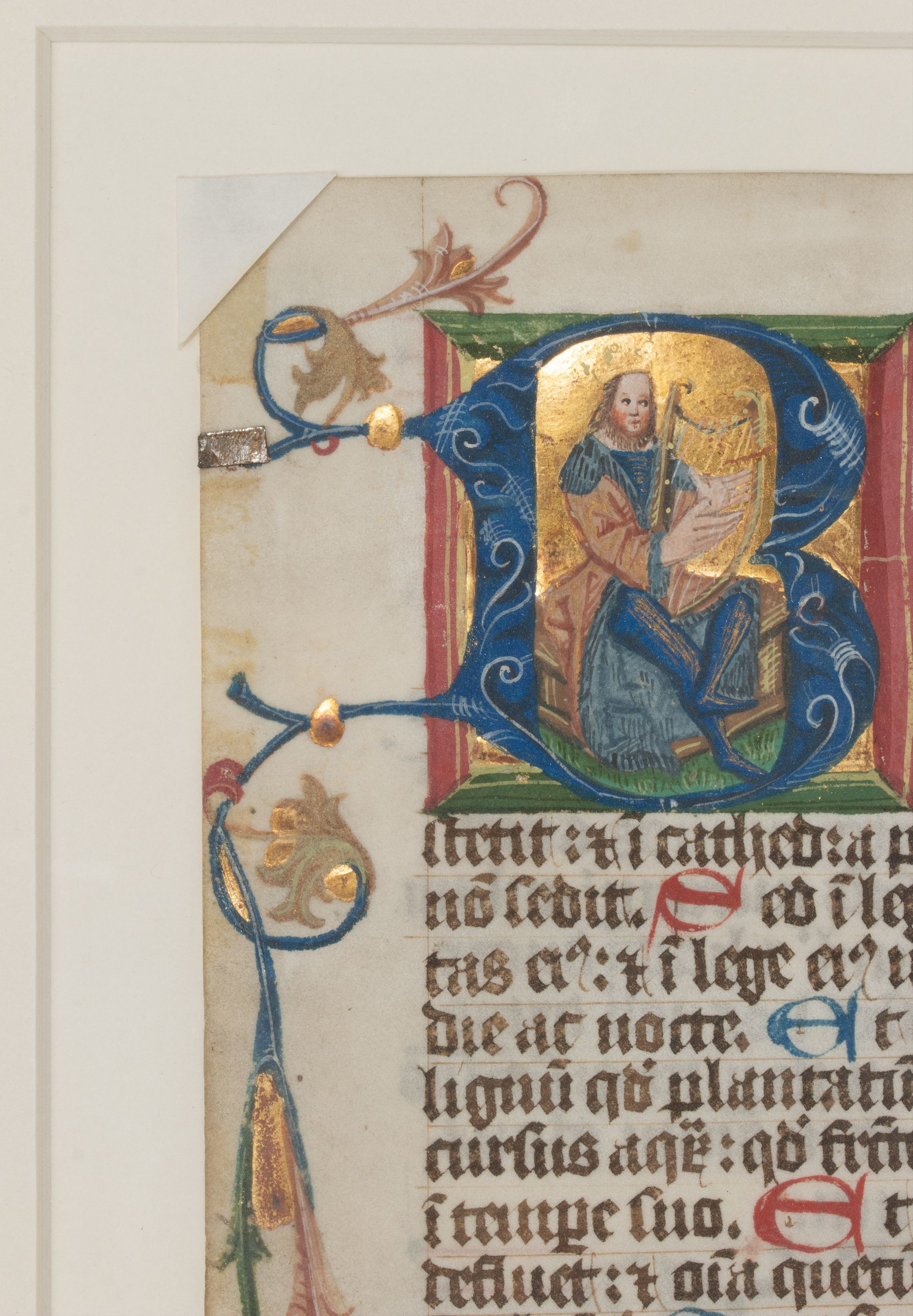 A 16C. PSALTER LEAF HISTORIATED INITIAL WITH KING DAVID